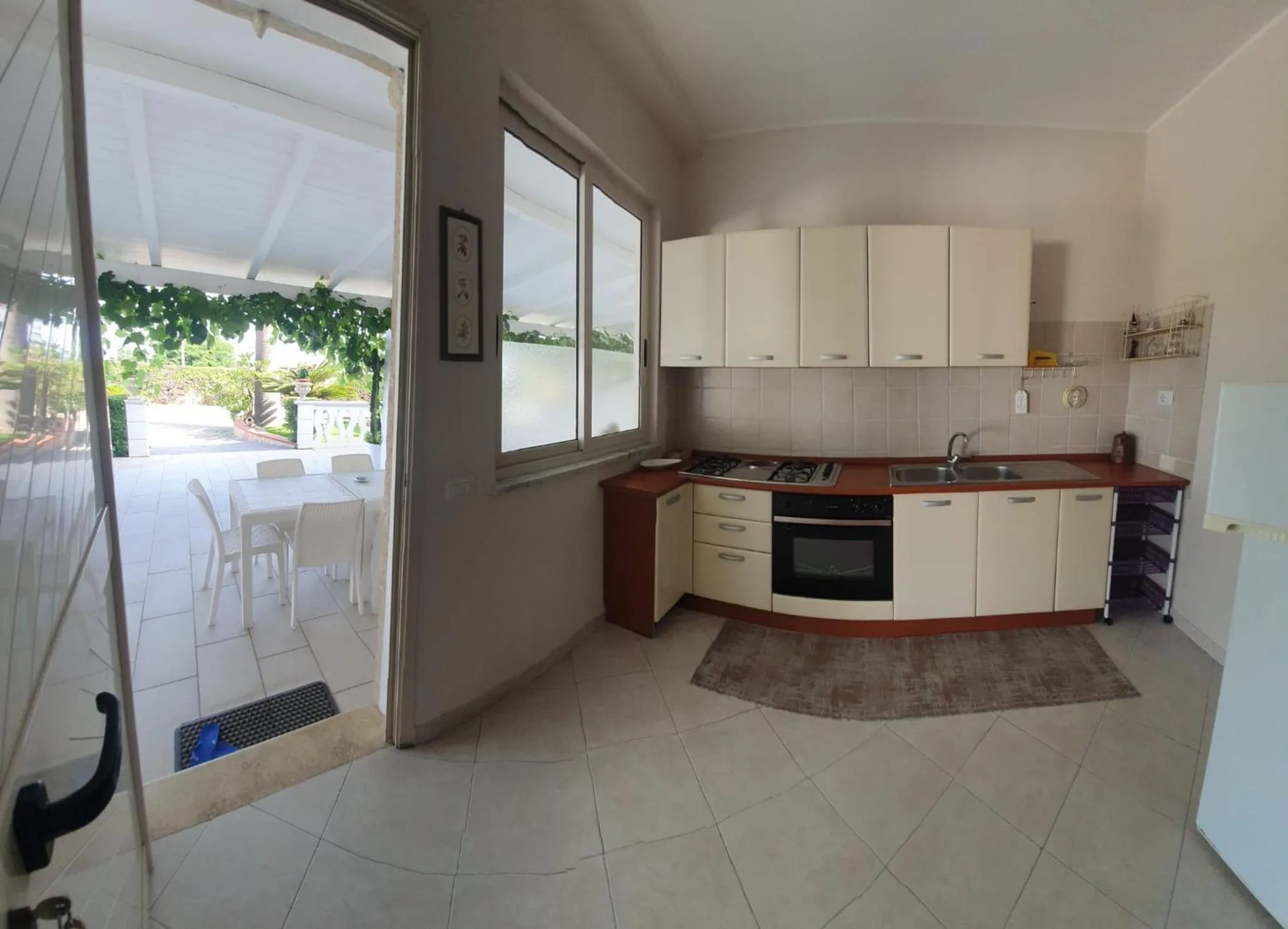 Kitchen or kitchenette in SANTA VENERE Apartments "PARCHEGGIO interno MOTO-AUTO" Ricarica auto Elettriche