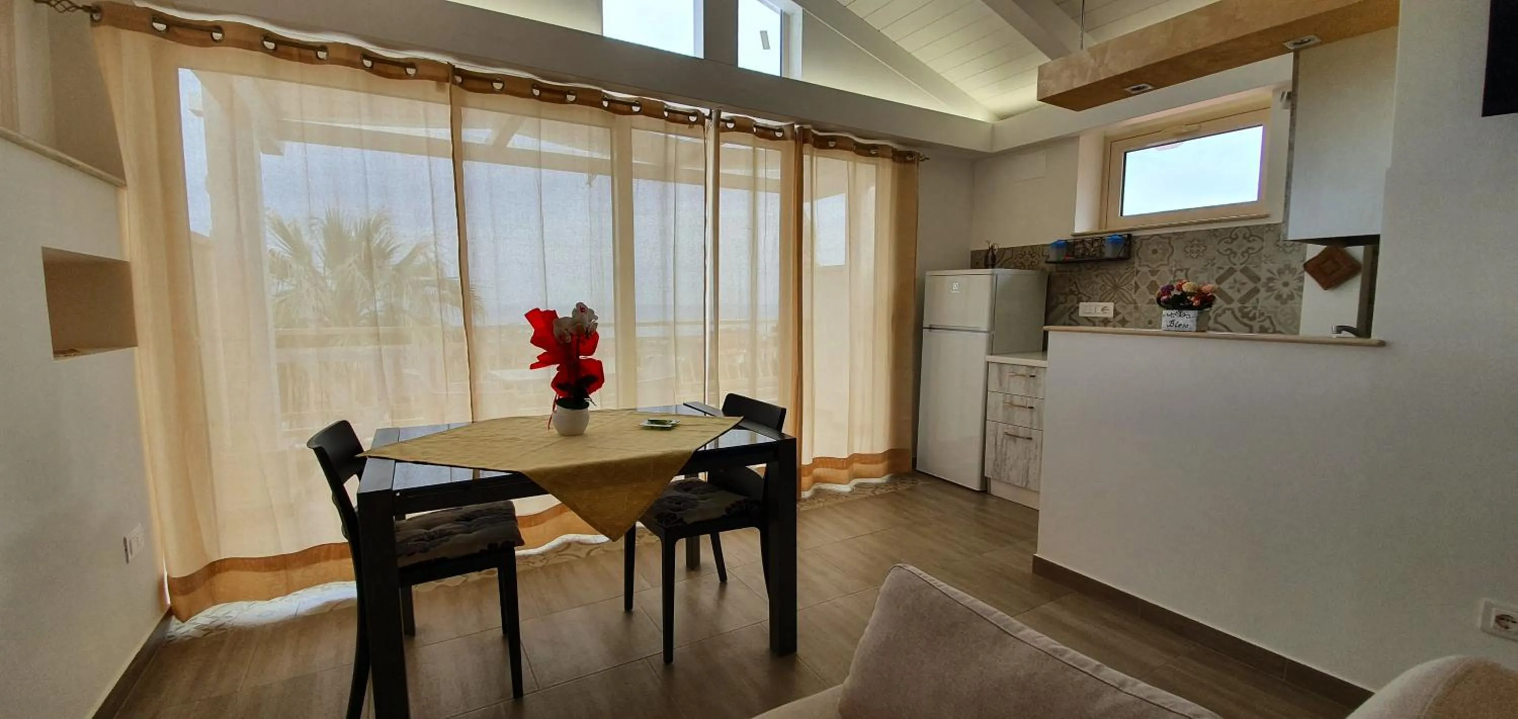 Kitchen or kitchenette in SANTA VENERE Apartments "PARCHEGGIO interno MOTO-AUTO" Ricarica auto Elettriche
