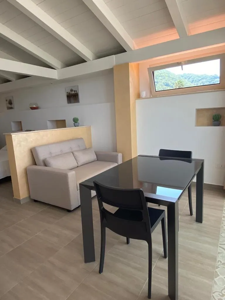 Living room in SANTA VENERE Apartments "PARCHEGGIO interno MOTO-AUTO" Ricarica auto Elettriche