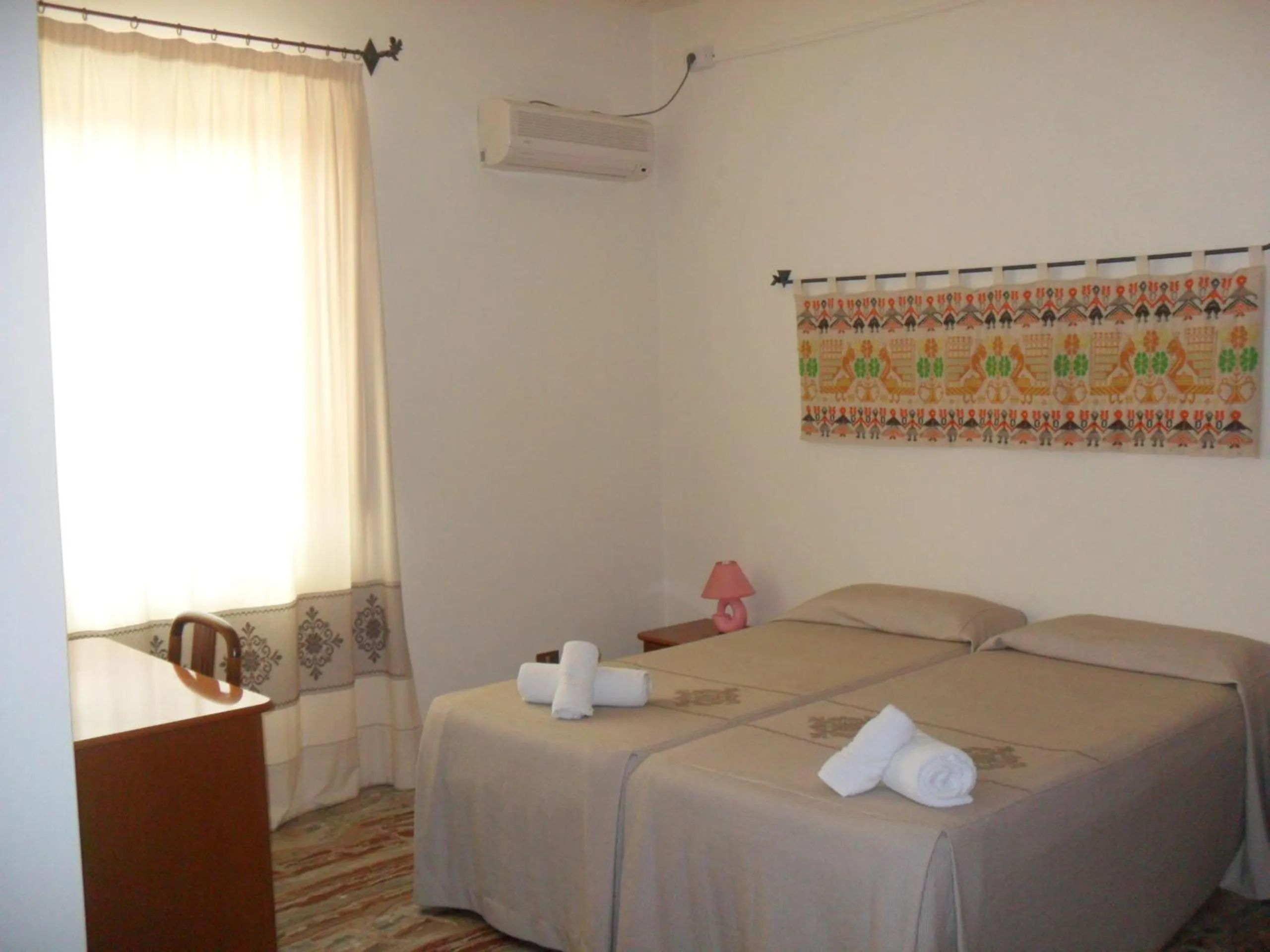 air conditioner, Bed in Hotel Plammas