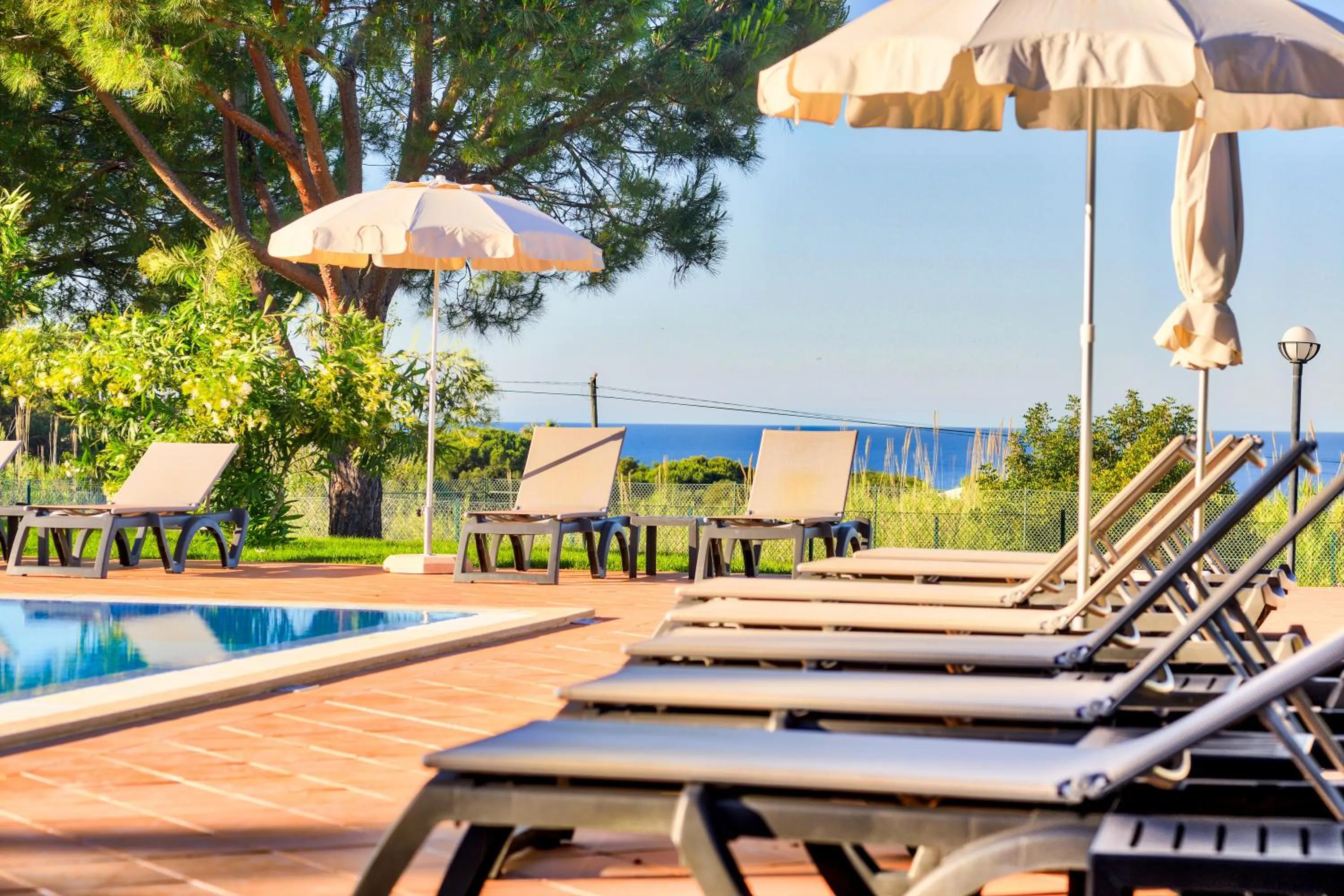 Swimming pool in Moradias Villas Rufino