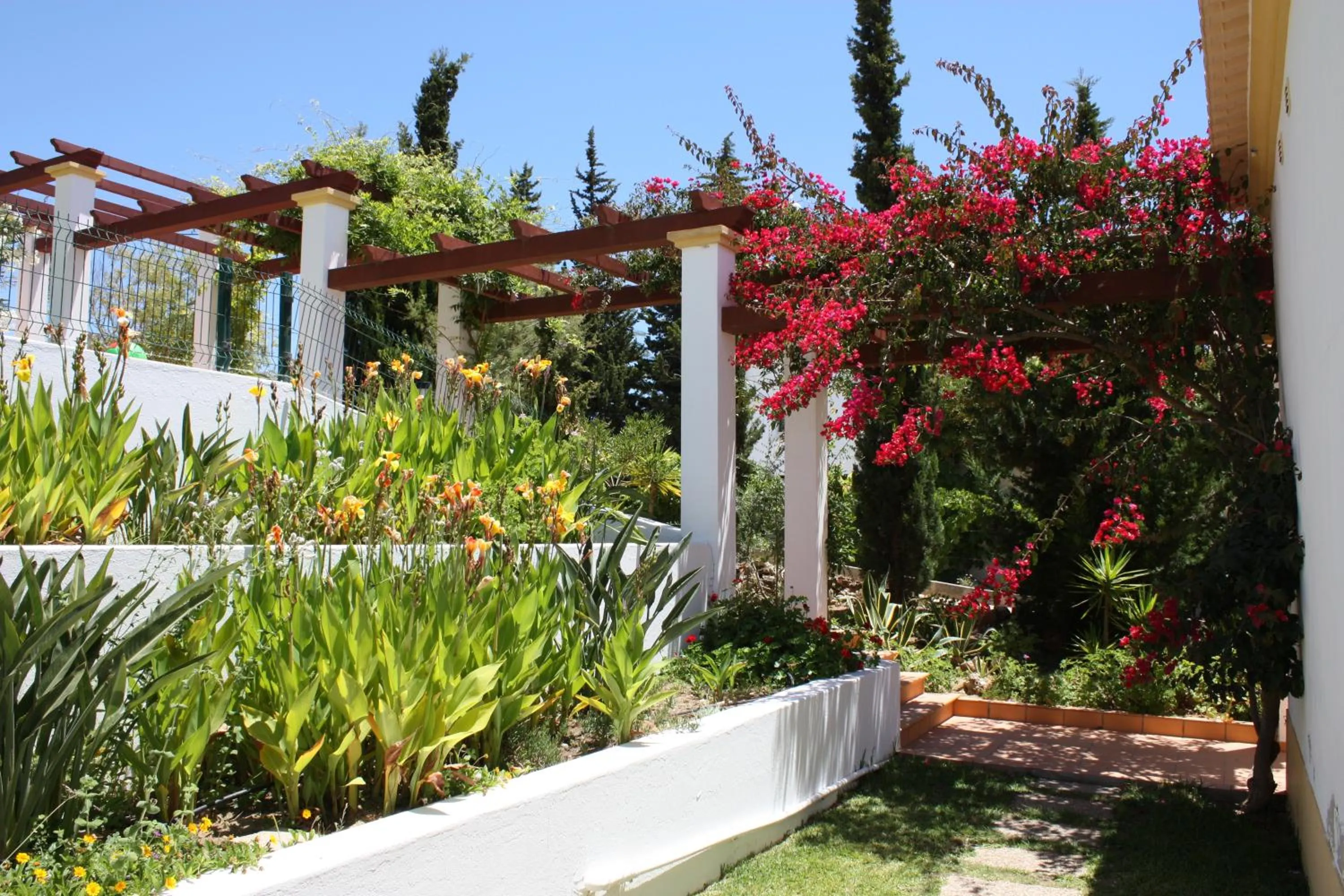 Garden view in Moradias Villas Rufino