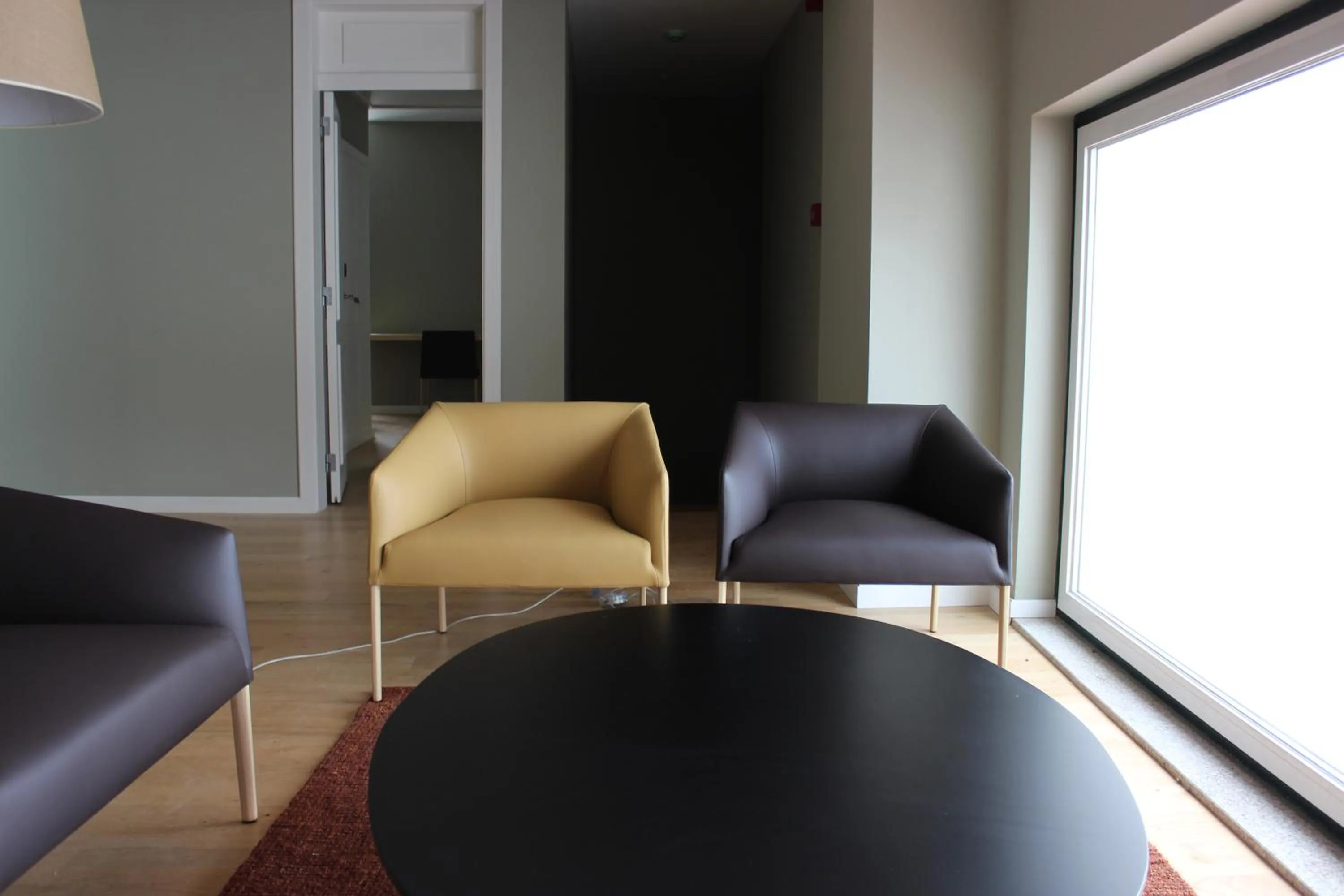 Communal lounge/ TV room in Hotel Medieval® de Penedono