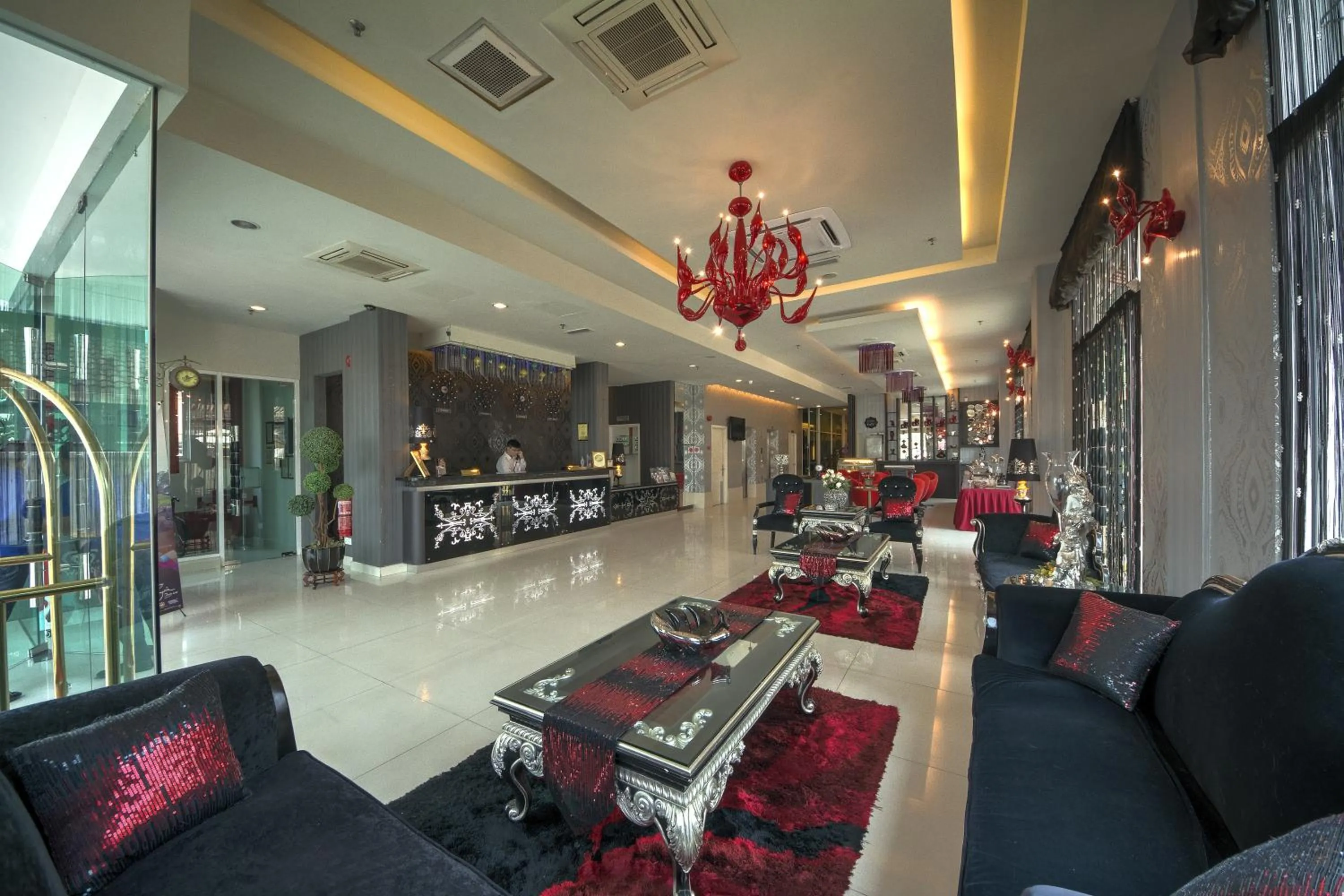 Lobby or reception in Arenaa Deluxe Hotel