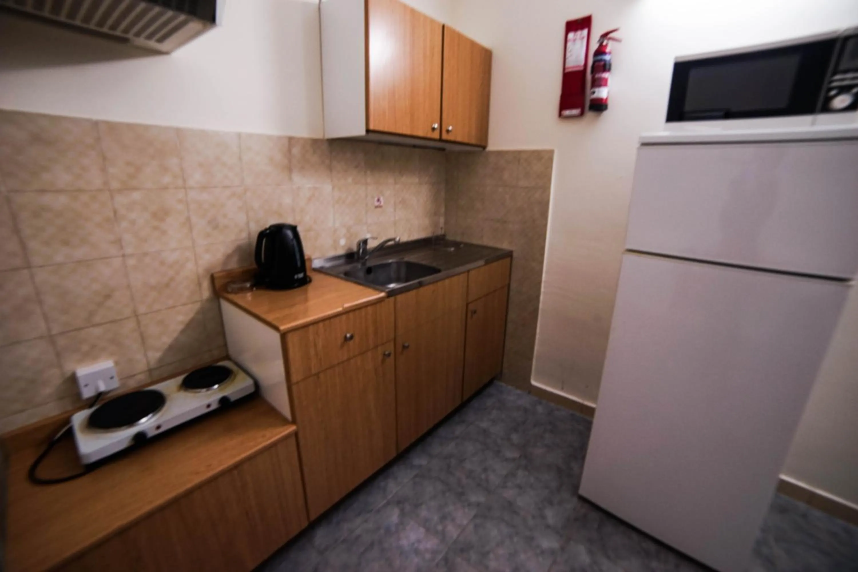 Kitchen or kitchenette in Qawra Point Holiday Complex