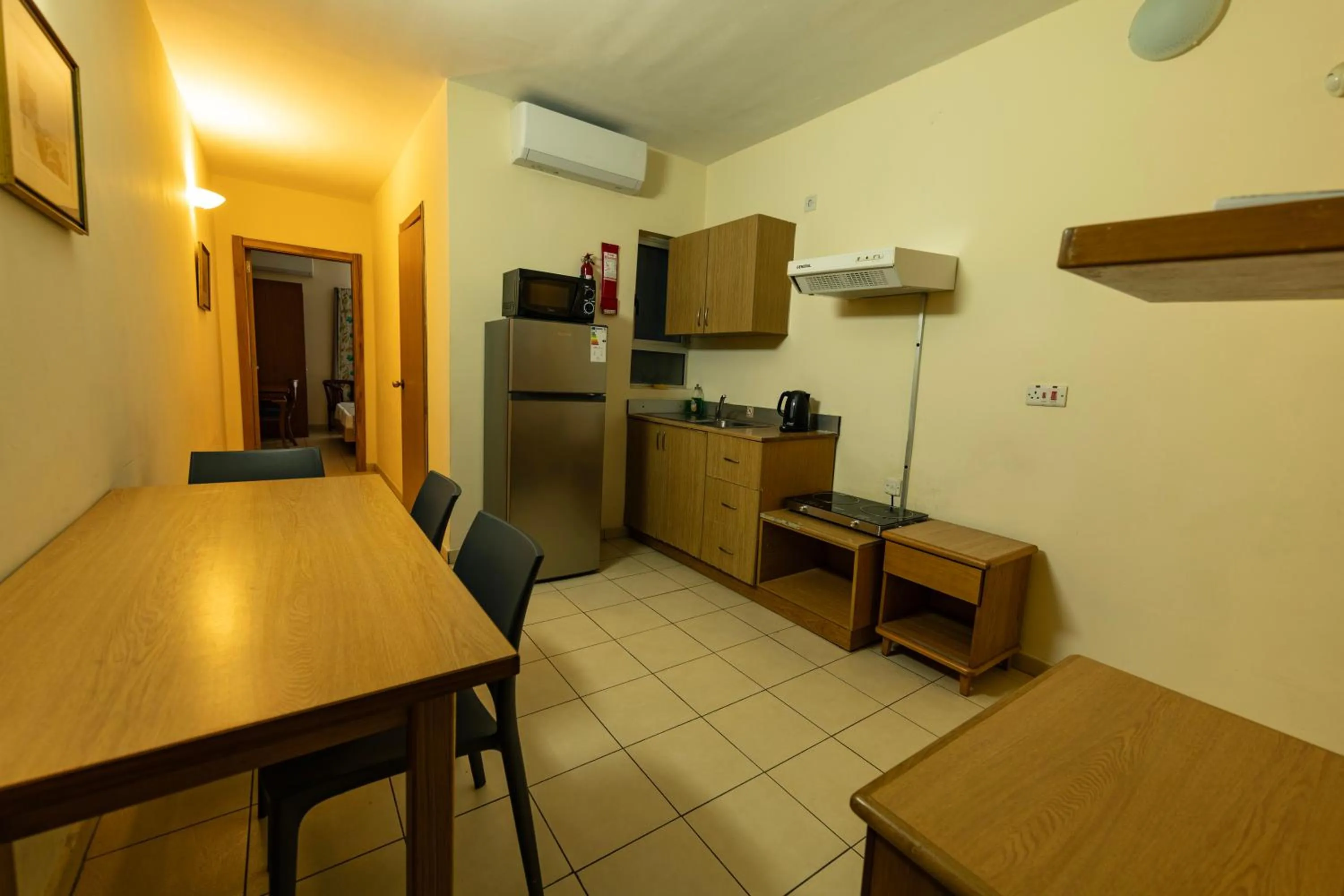 Kitchen or kitchenette in Qawra Point Holiday Complex