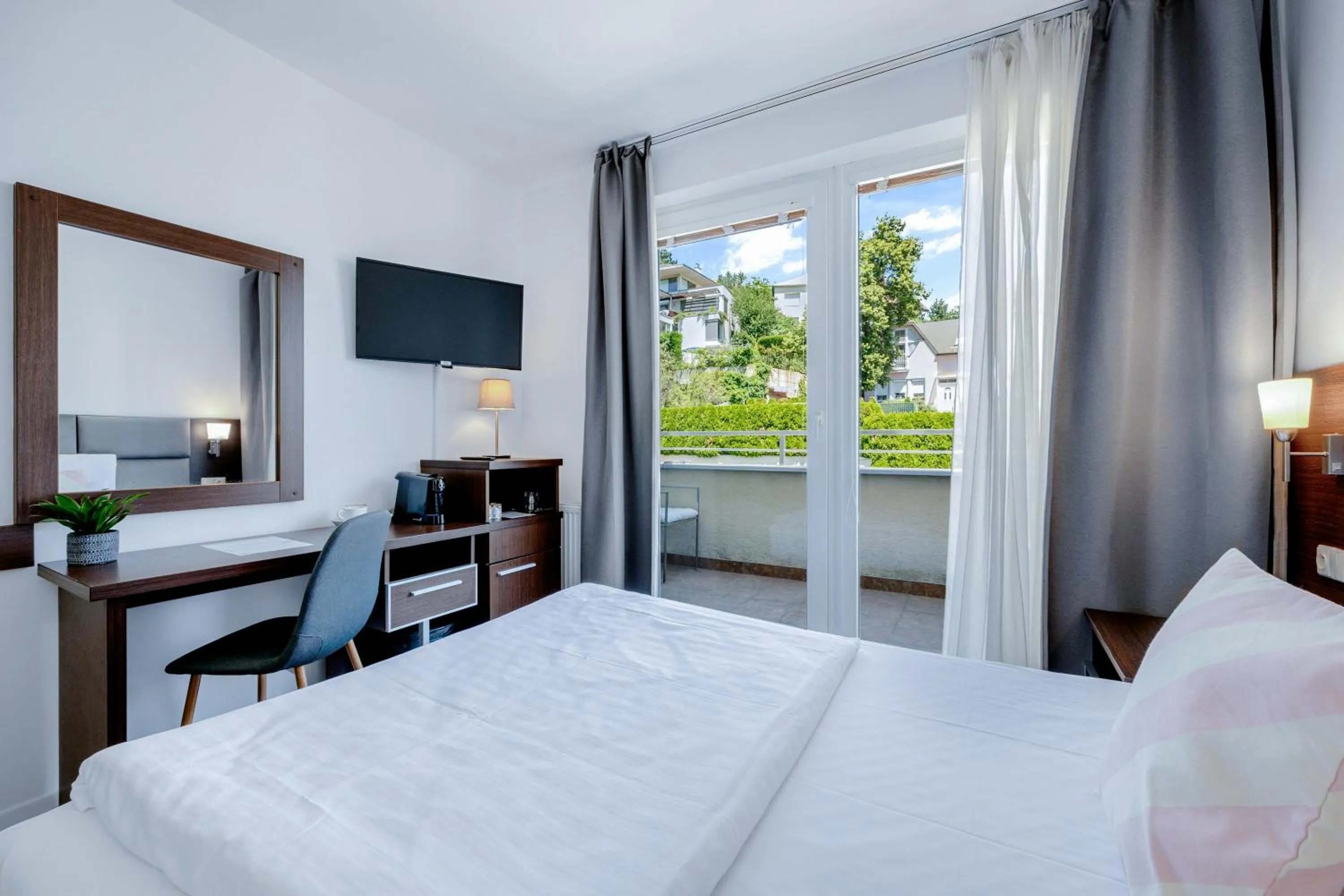 TV and multimedia, Bed in Hotel ANTARES