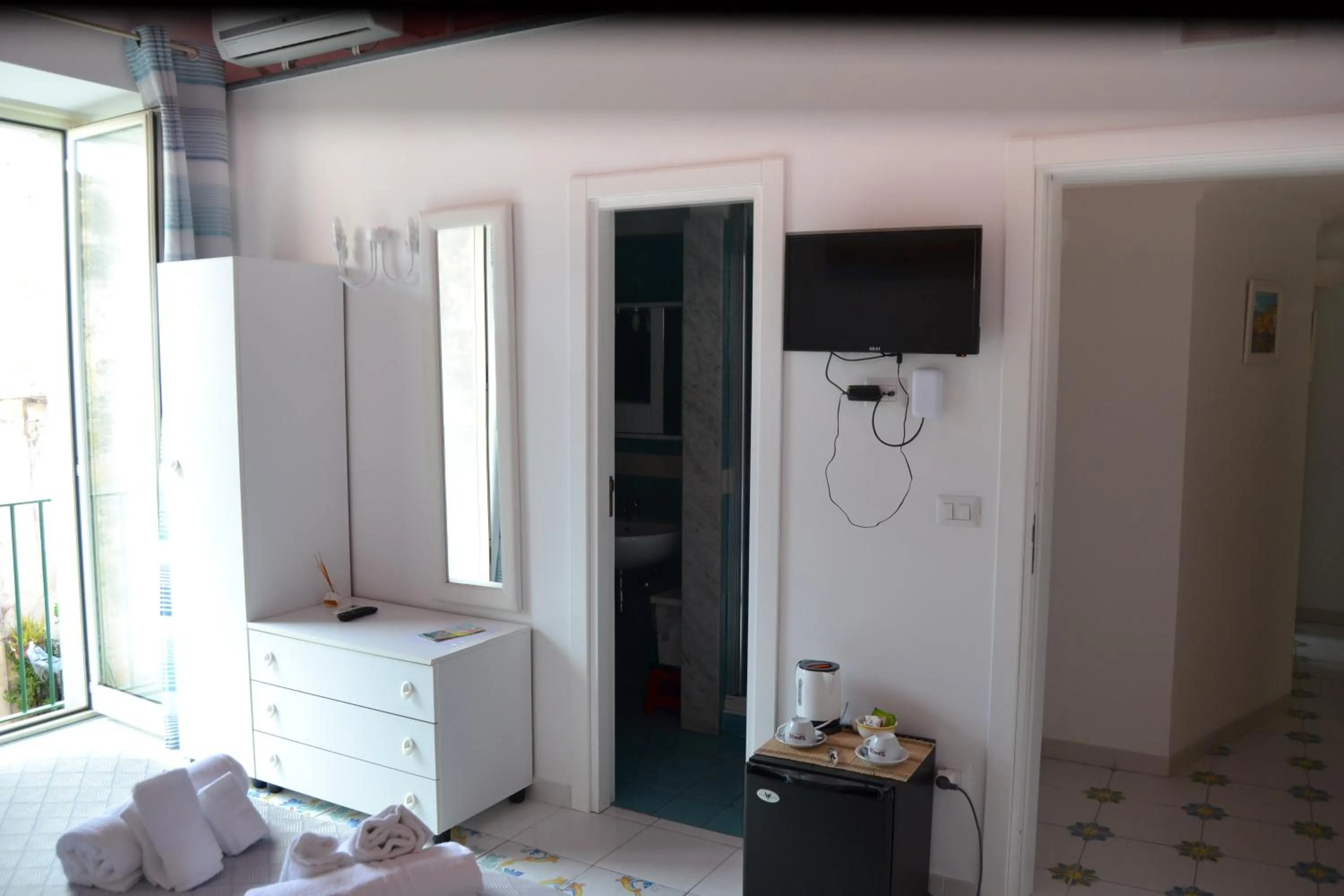 Bed in Il Borghetto Apartments & Rooms