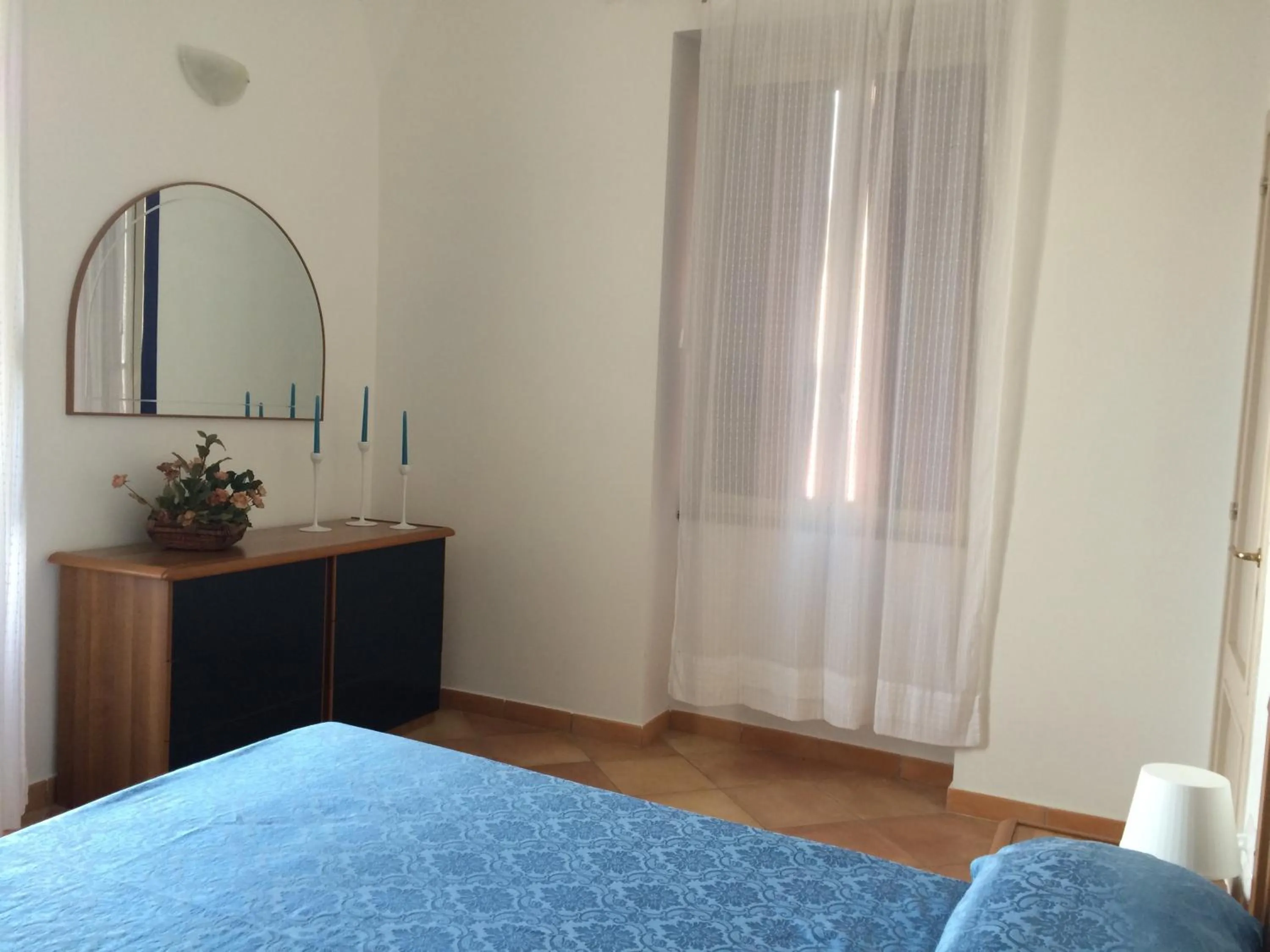 Decorative detail, Bed in Il Borghetto Apartments & Rooms