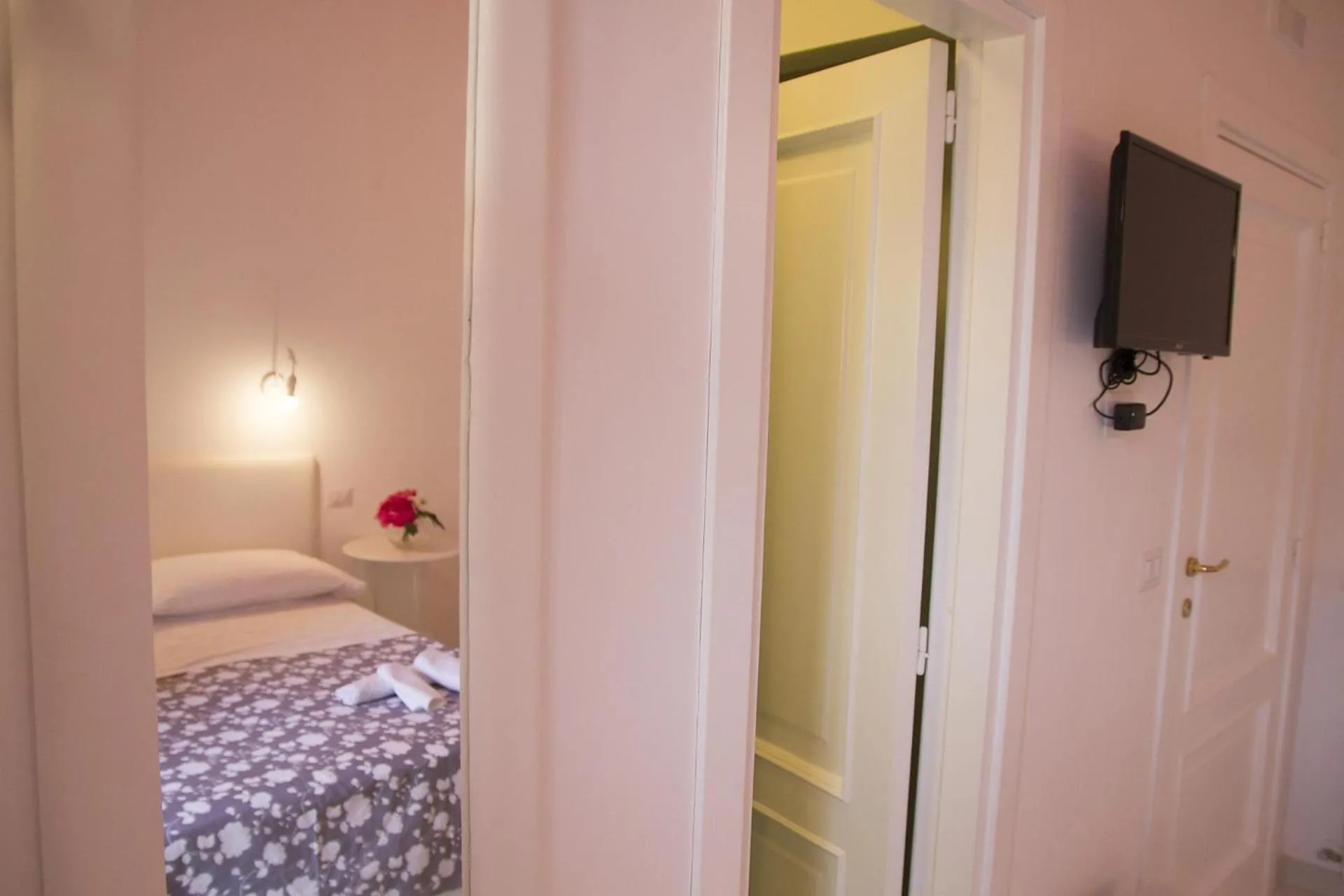 Bed in Il Borghetto Apartments & Rooms