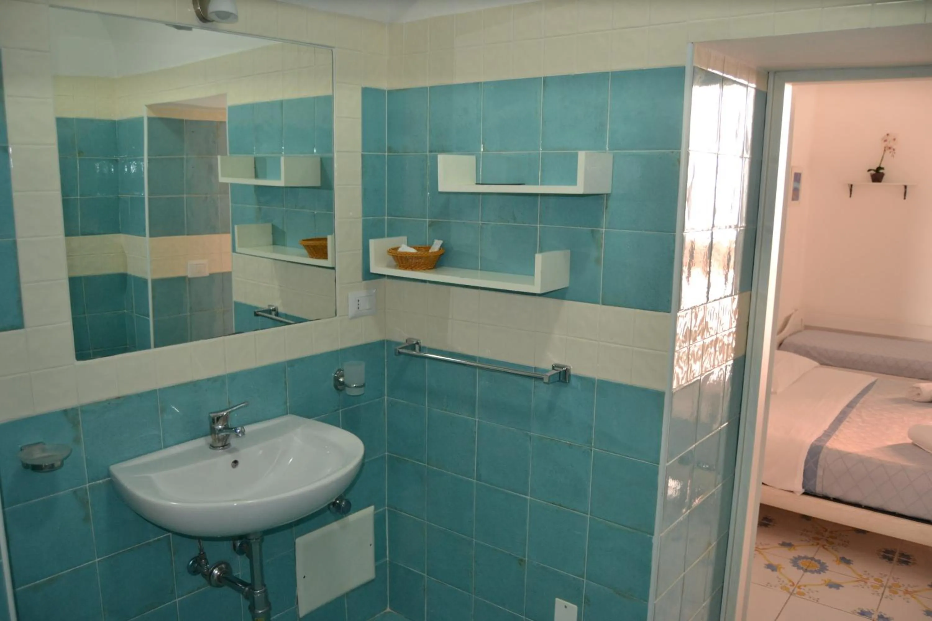 Bed in Il Borghetto Apartments & Rooms