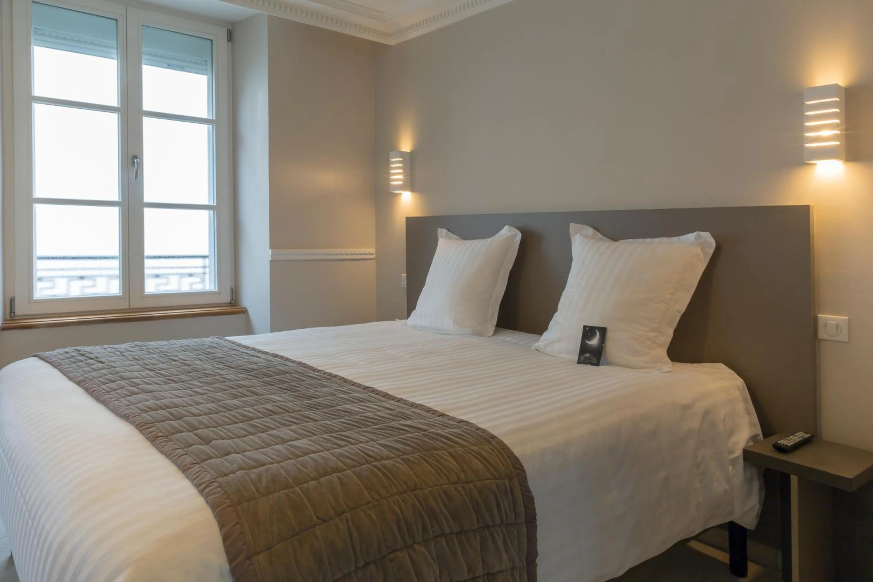 Bed in Hotel Jean Moët