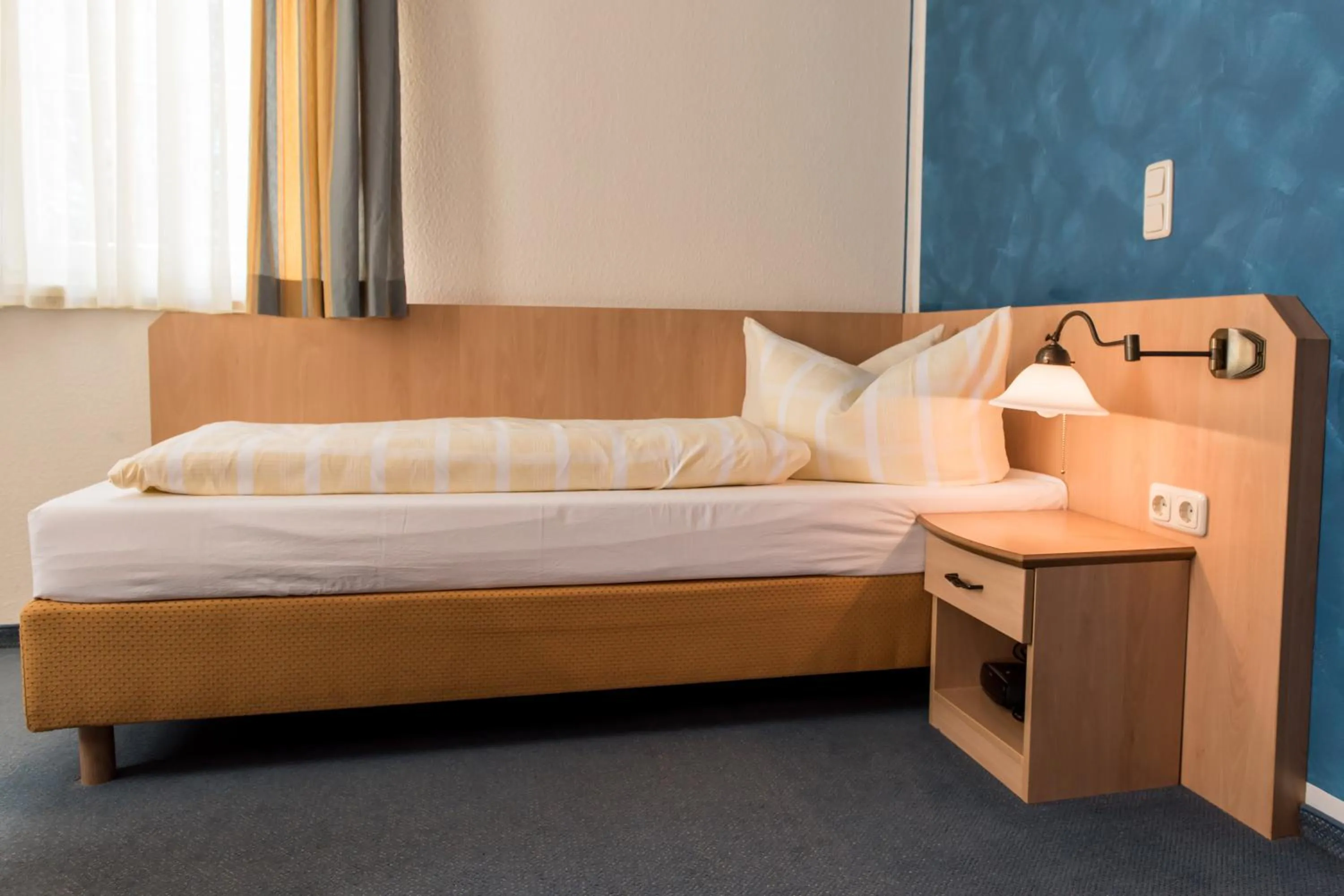 Bed in Gästehaus Weidenmühle