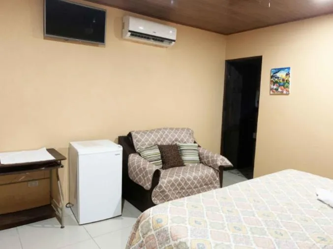 Bed in Aunty Arenal Lodge