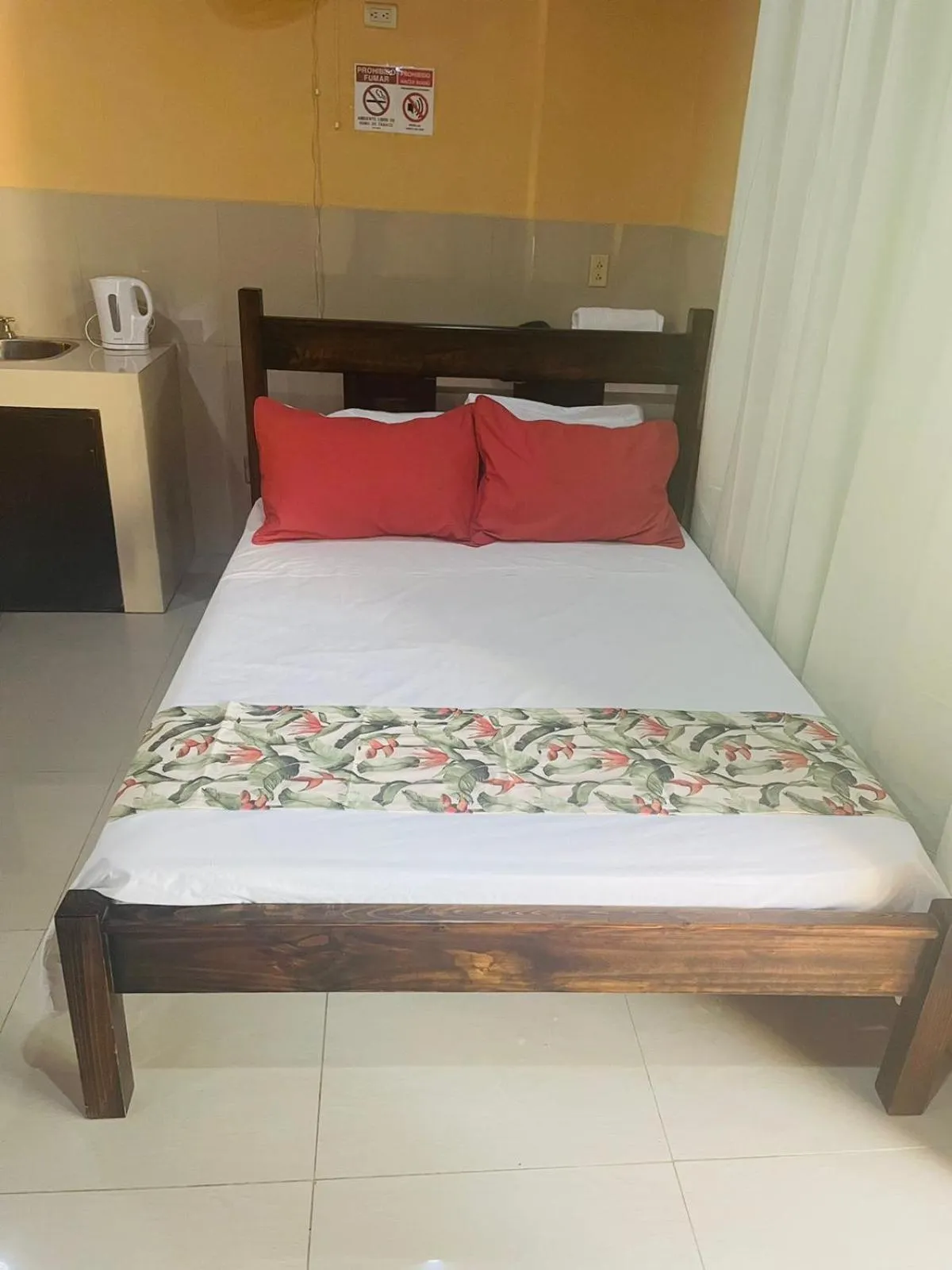 Bed in Aunty Arenal Lodge