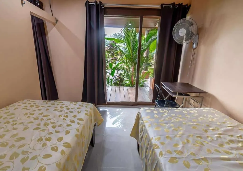 Bed in Aunty Arenal Lodge