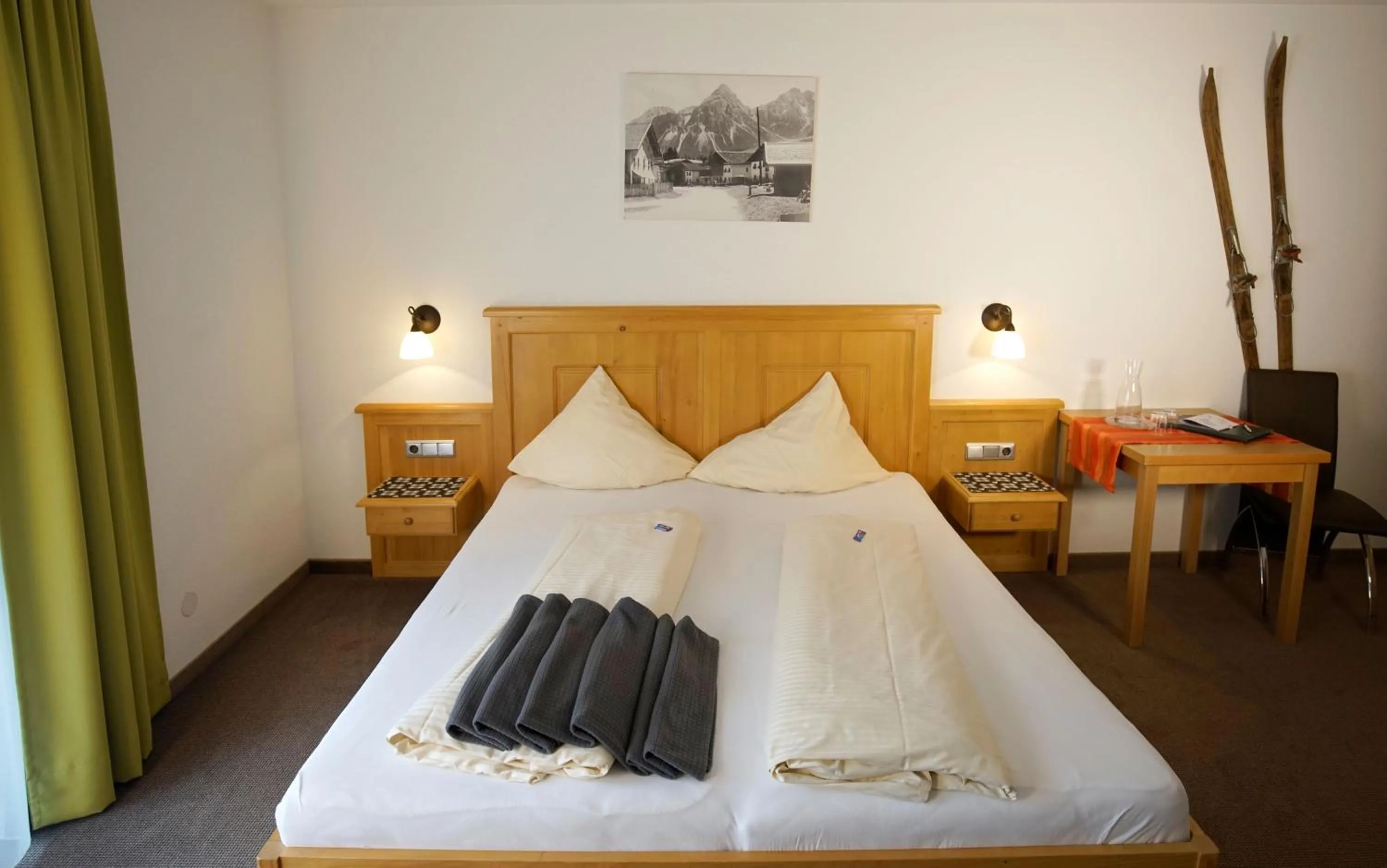 Bedroom, Bed in Alpenstern rooms & suites