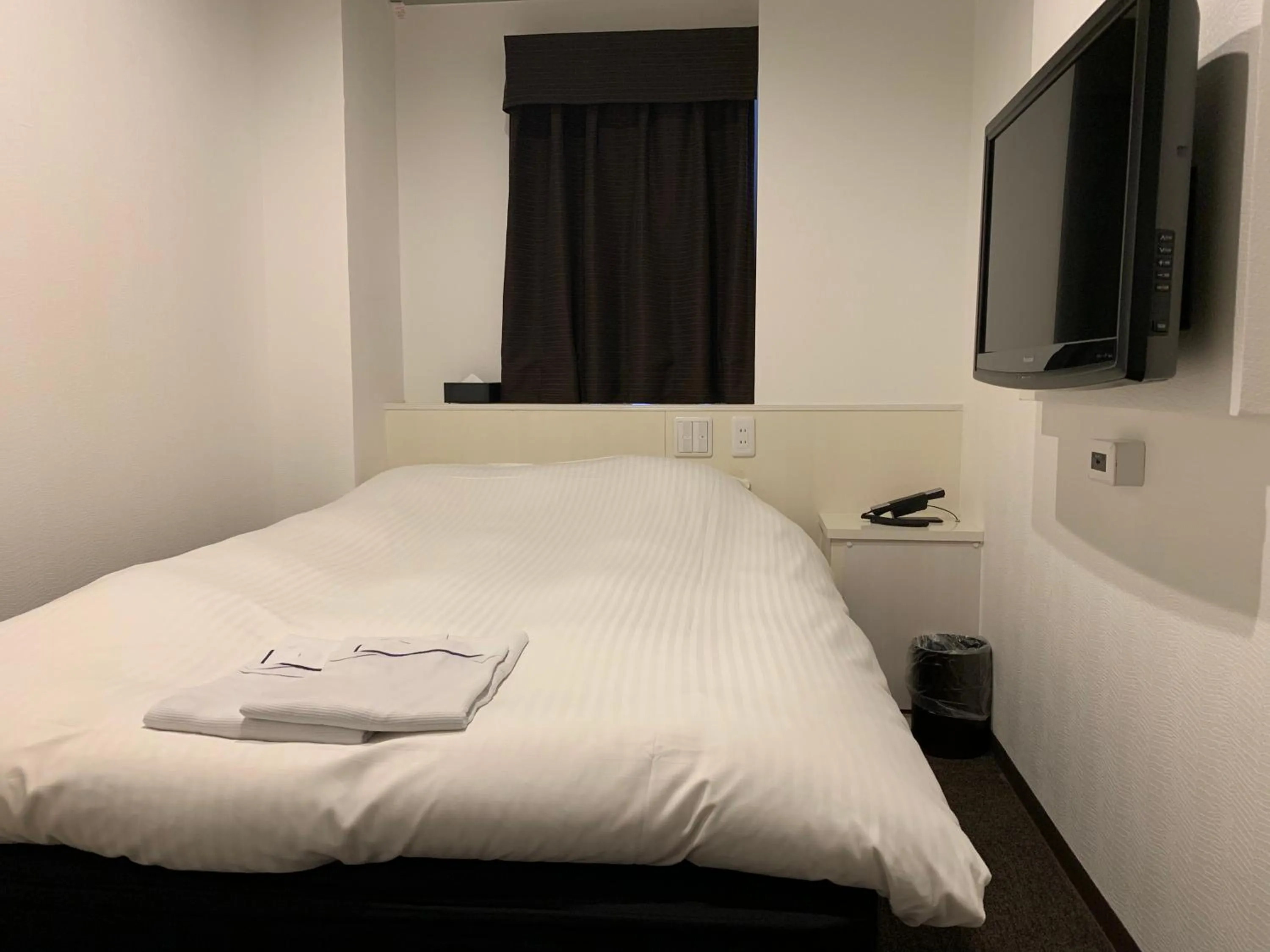 Bed in Nagoyaeki Access Hotel