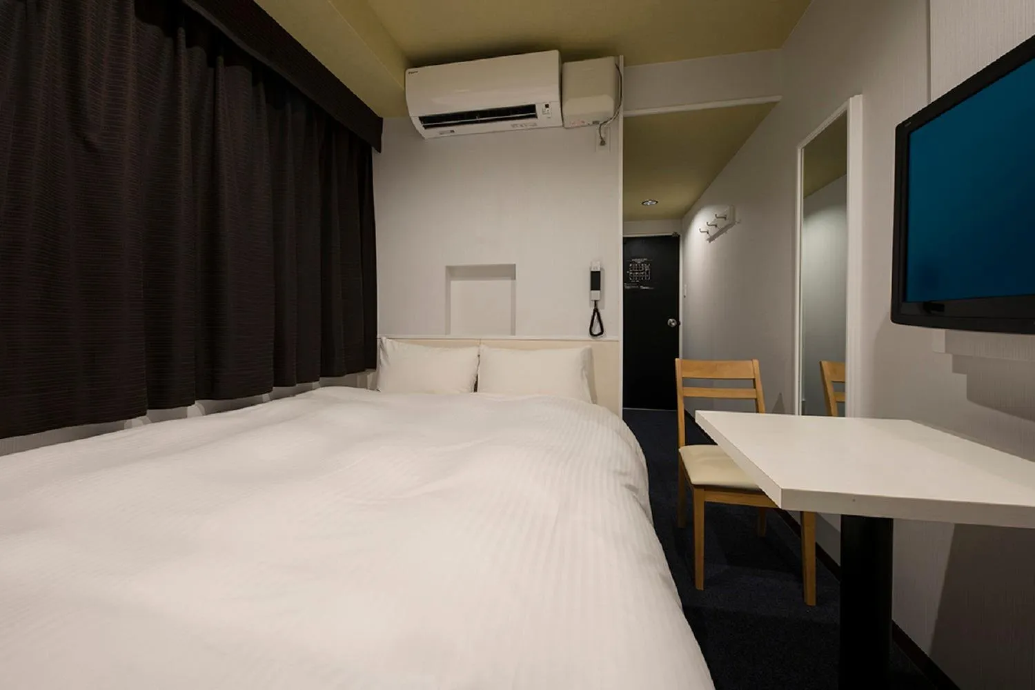 Bed in Nagoyaeki Access Hotel