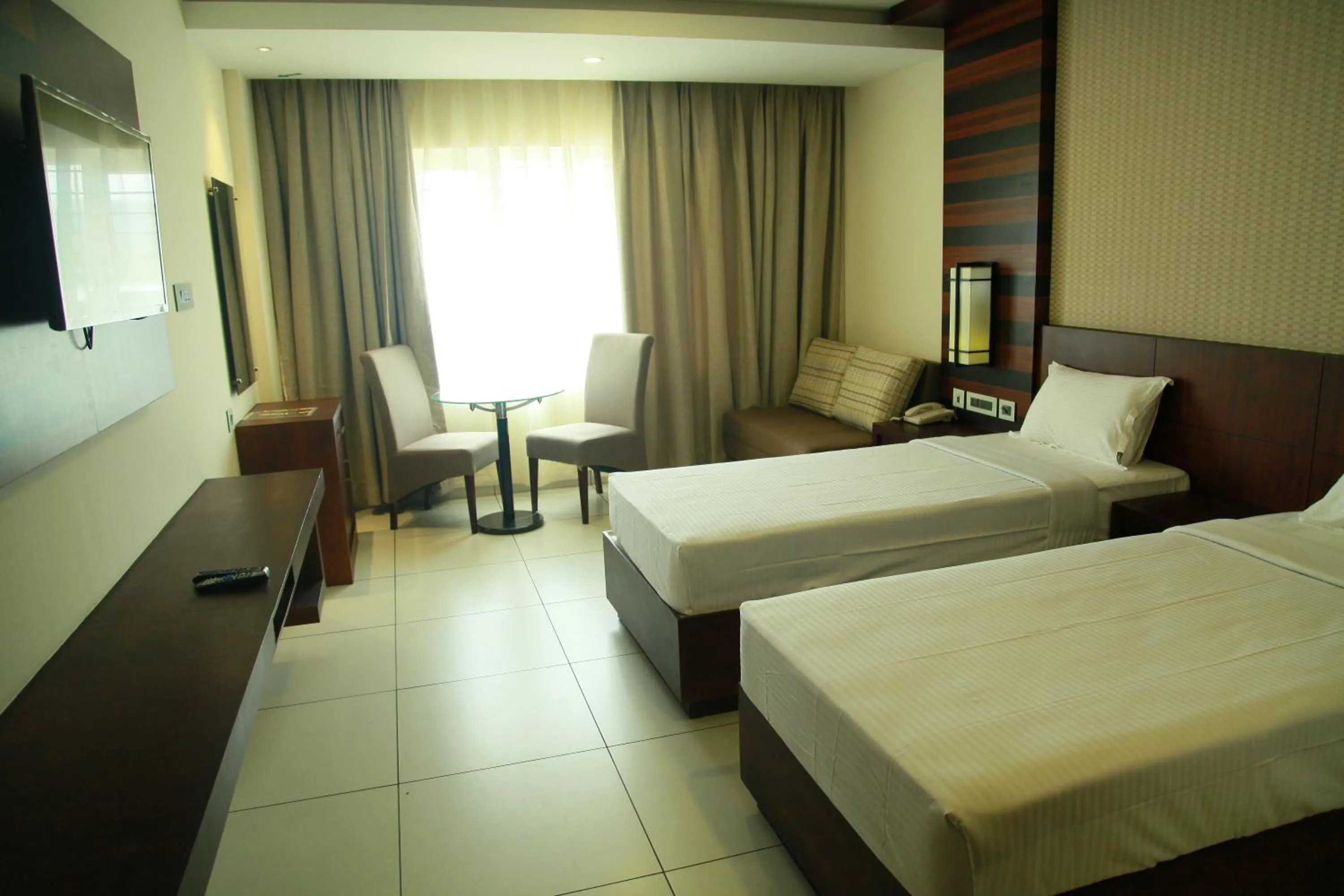 Bedroom, Bed in Vavas Inn & Suites