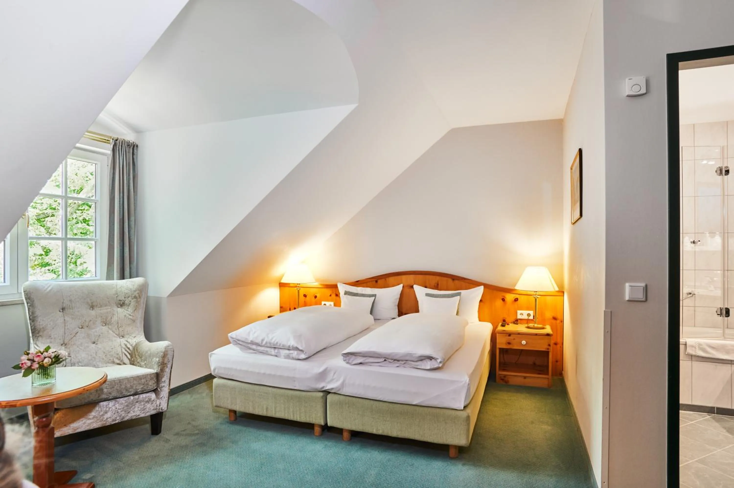 Photo of the whole room, Bed in Hotel Freisinger Hof