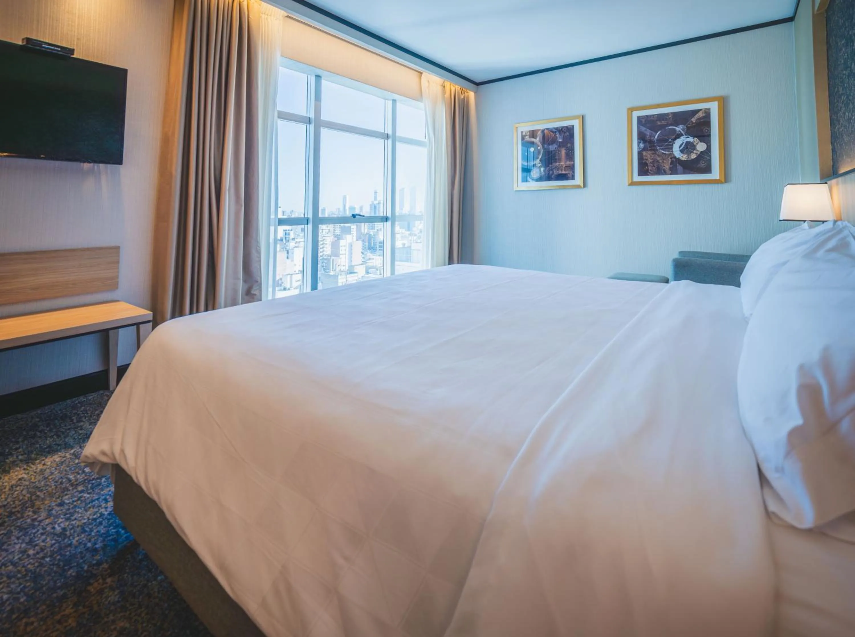 Bed in Holiday Inn Rosario by IHG