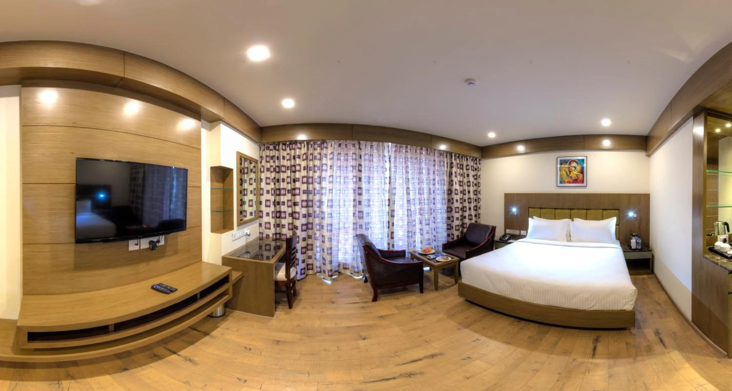 Living room, Bed in Hotel Benzz Park Vellore