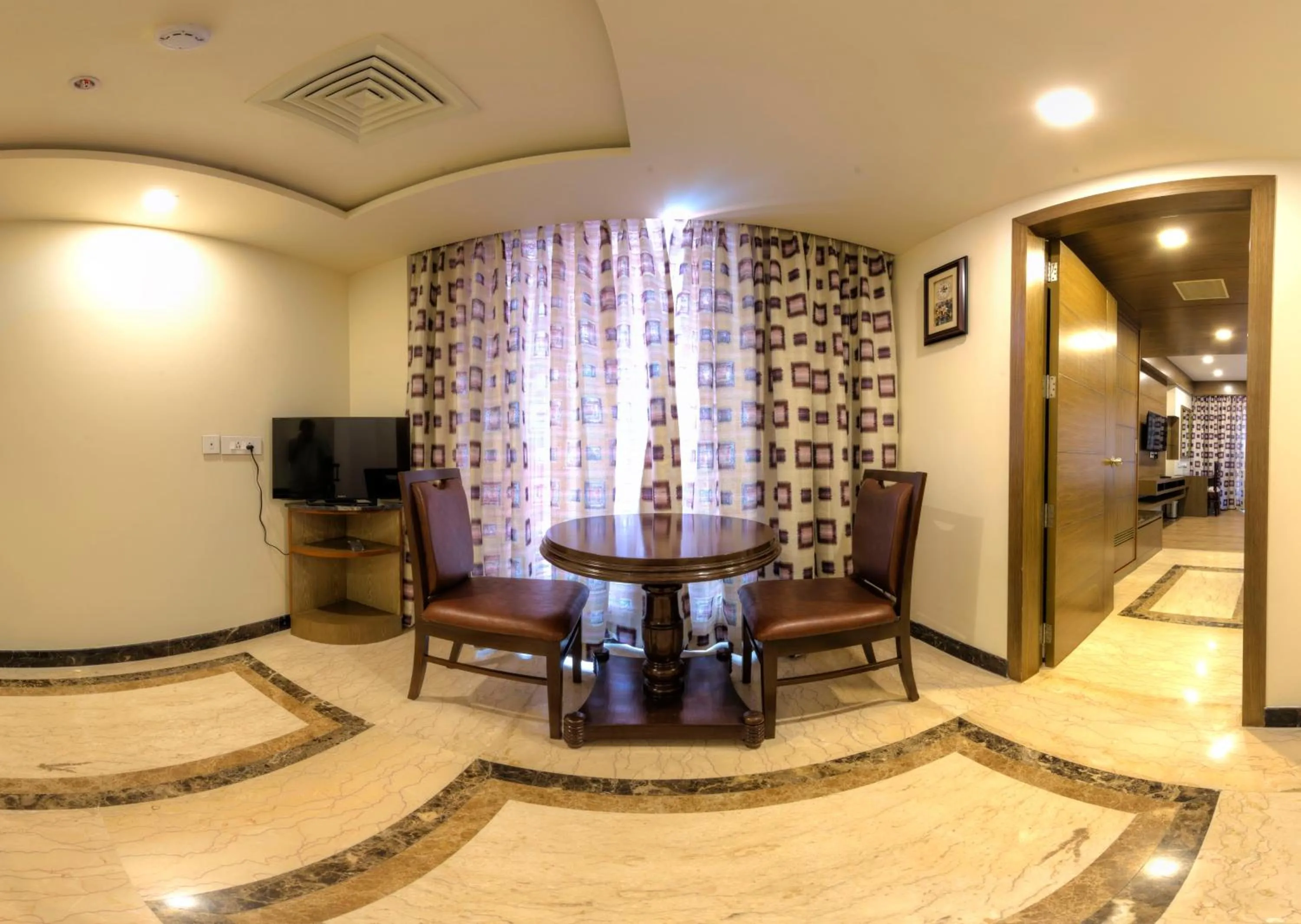 Living room in Hotel Benzz Park Vellore