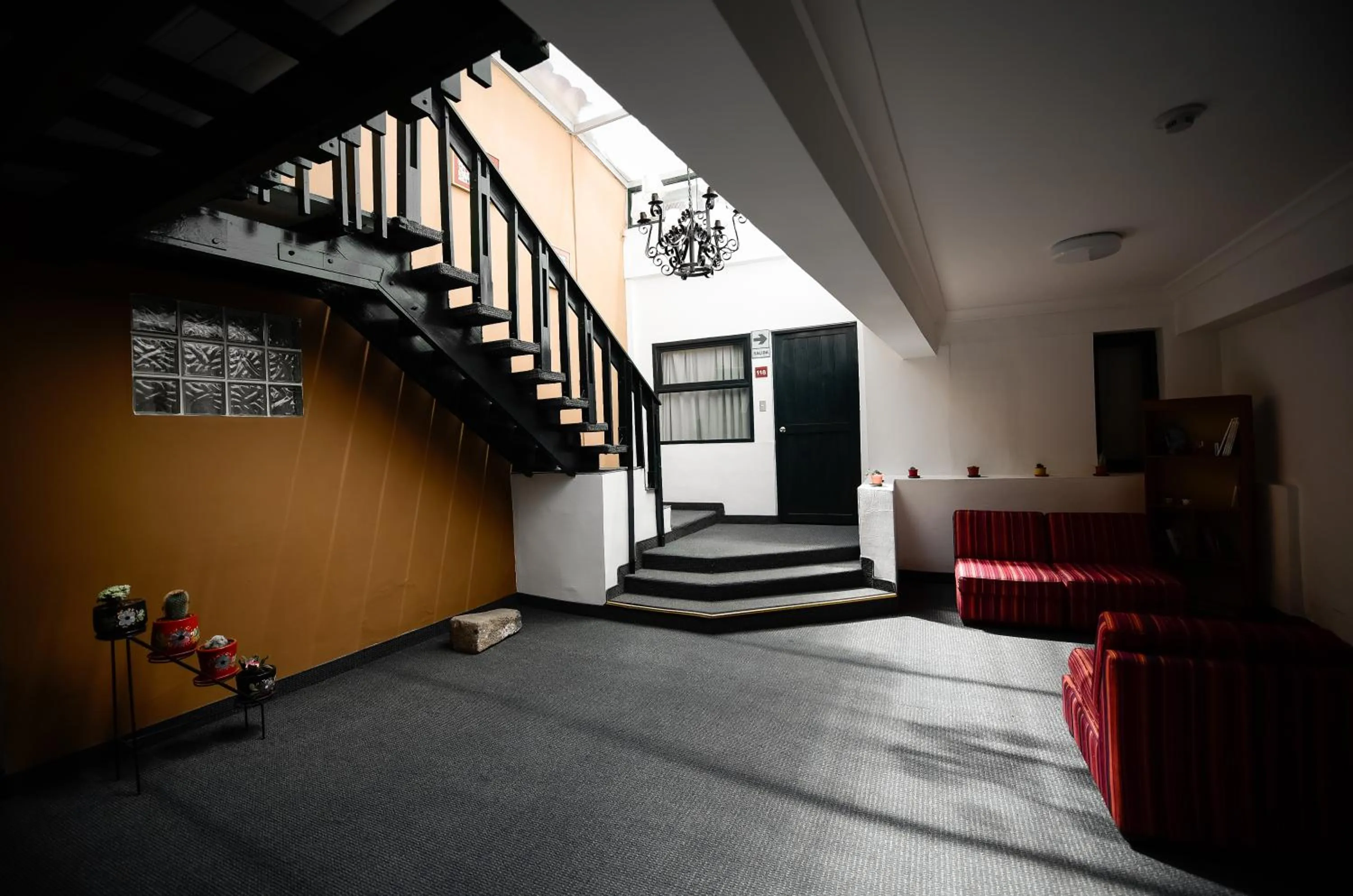 Living room, Bed in Hotel Raymi