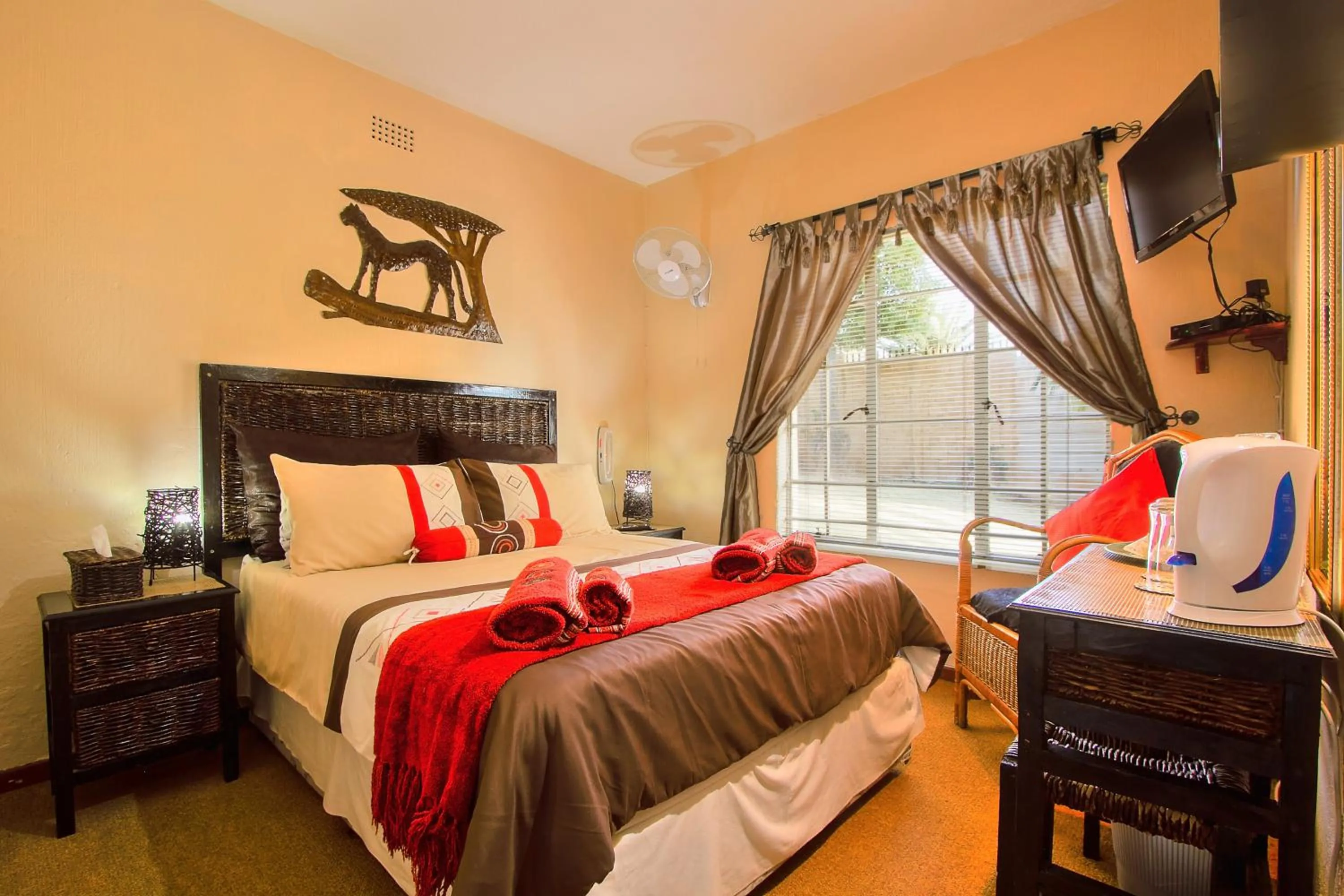 Photo of the whole room, Bed in All over Africa Guest house