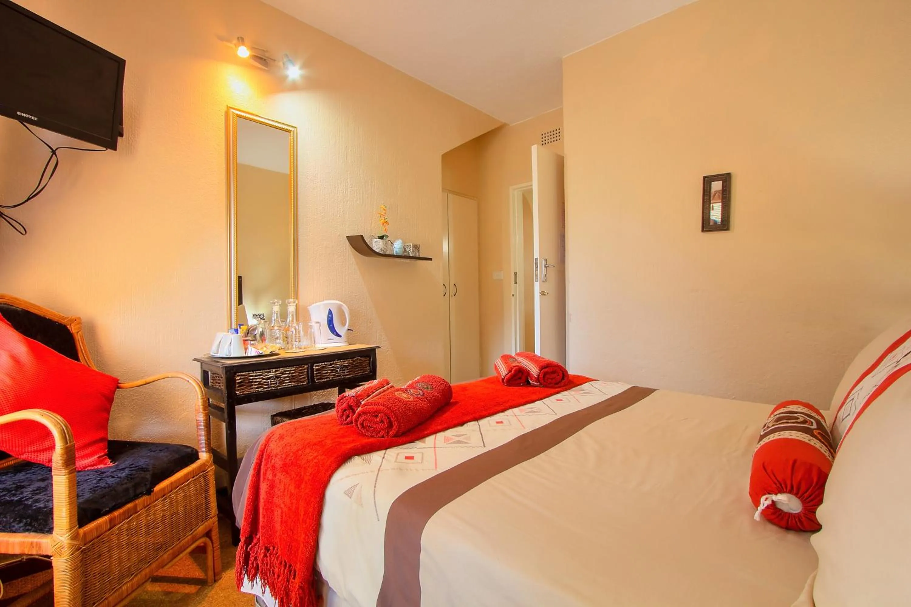 Photo of the whole room, Bed in All over Africa Guest house