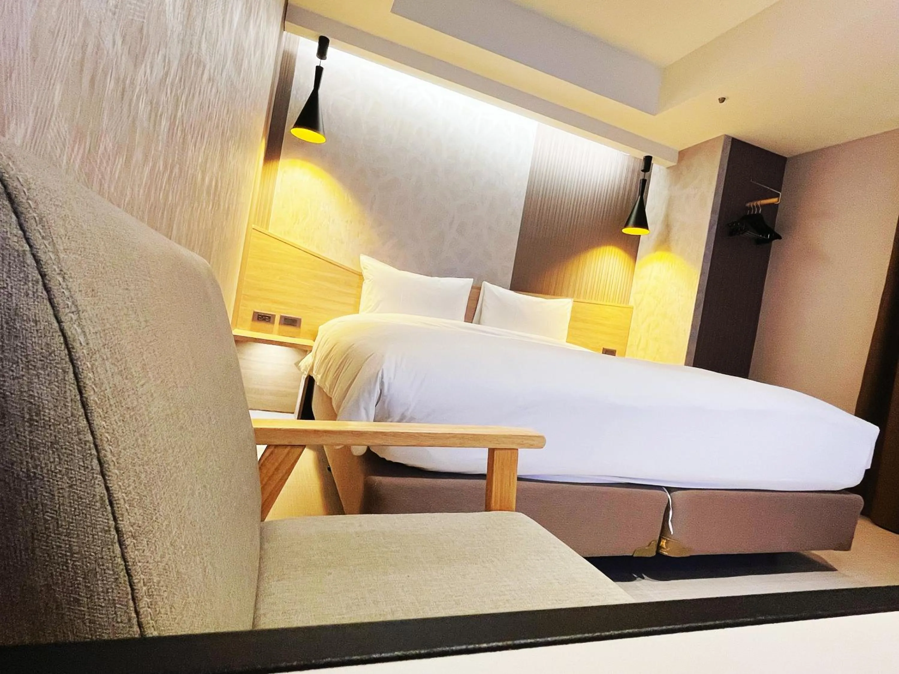 Living room, Bed in 新仕飯店-New City Hotel