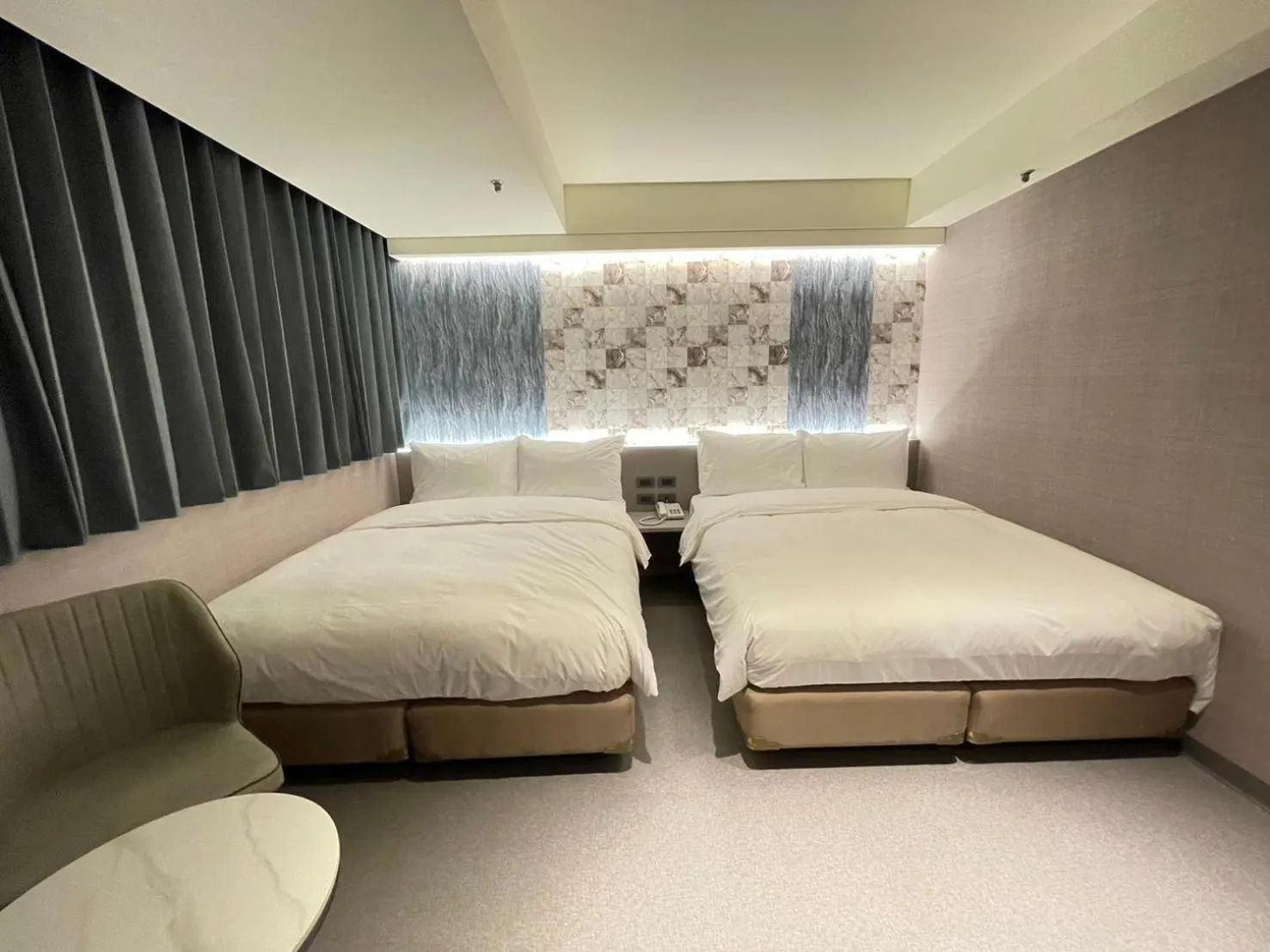 Bed in 新仕飯店-New City Hotel