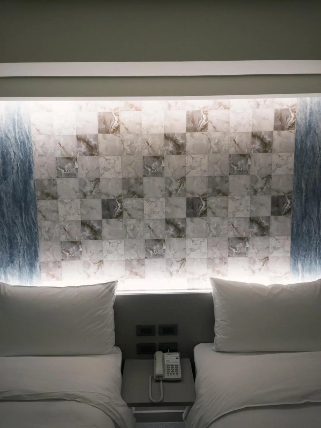 Bed in 新仕飯店-New City Hotel