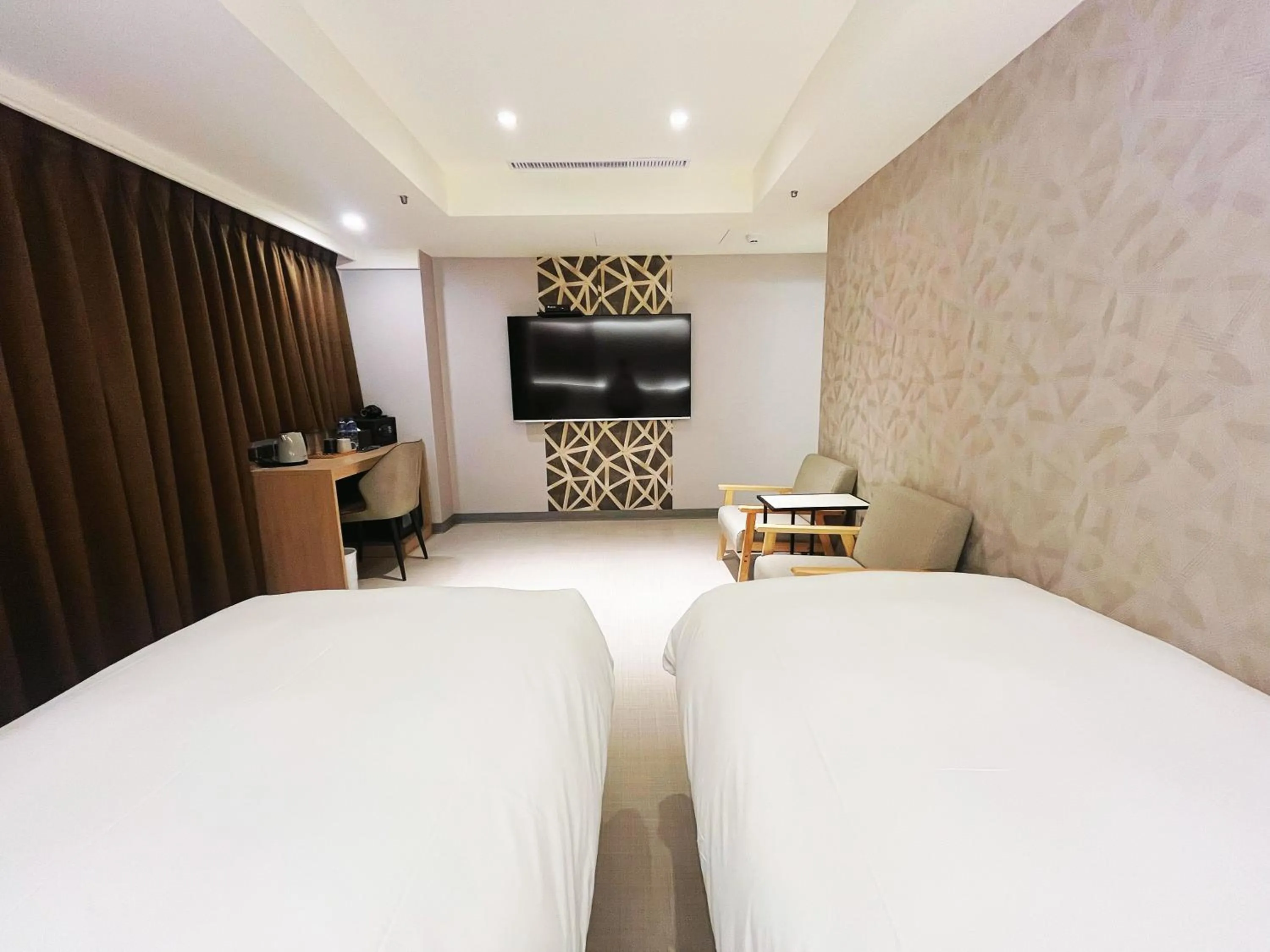 Bed in 新仕飯店-New City Hotel