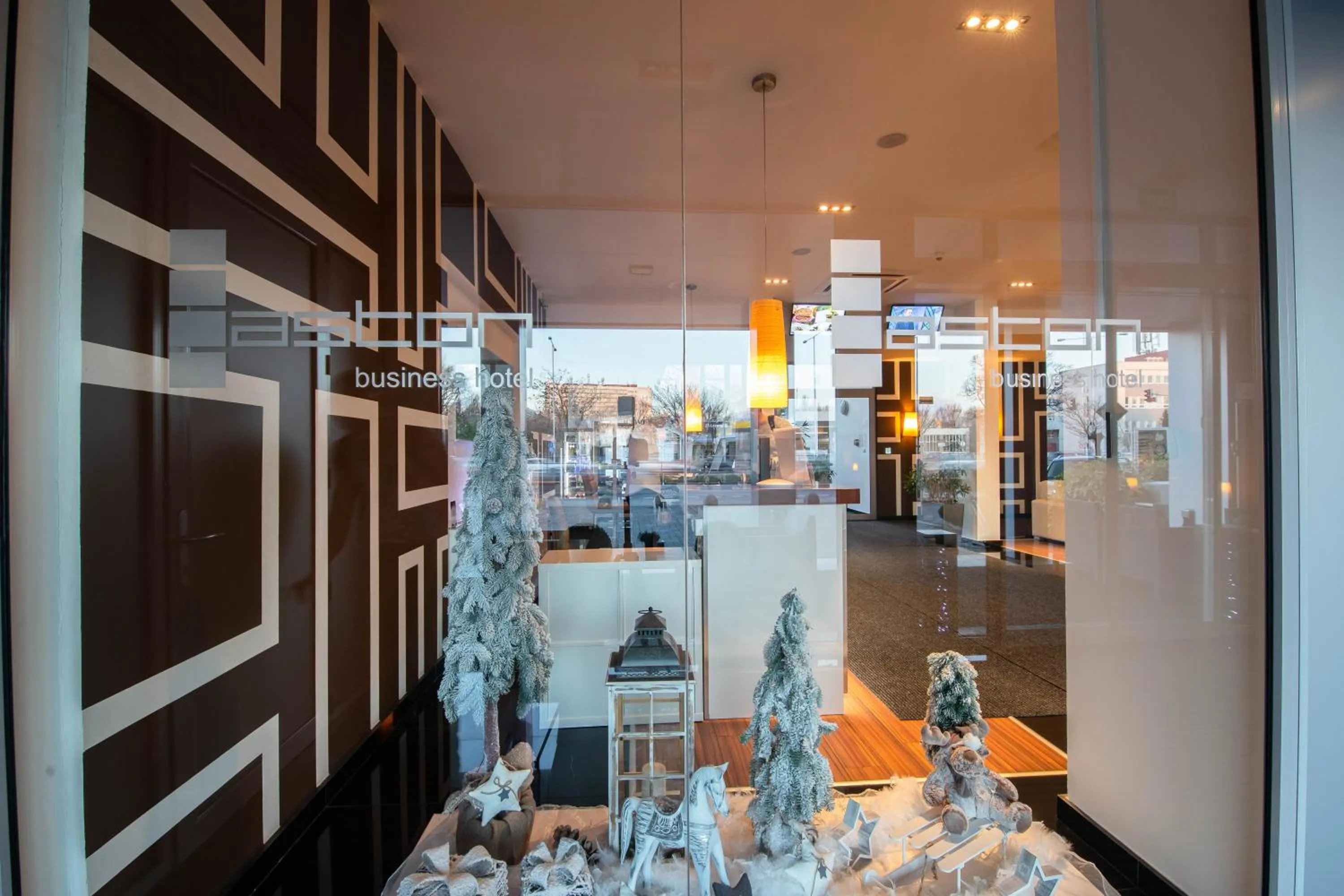 Lobby or reception in Aston Hotel