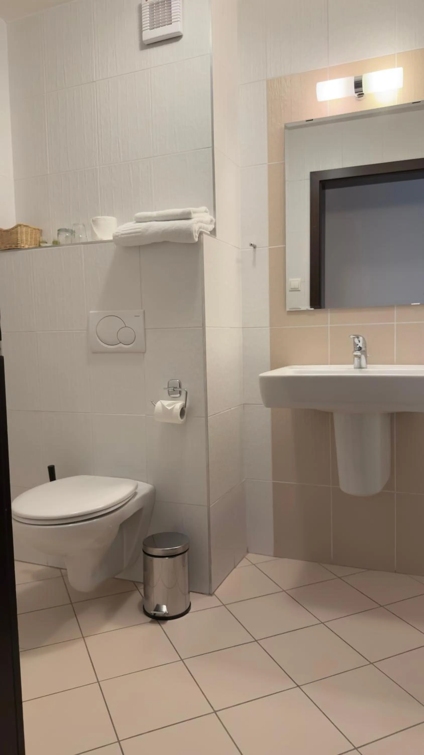 Toilet in Aston Hotel