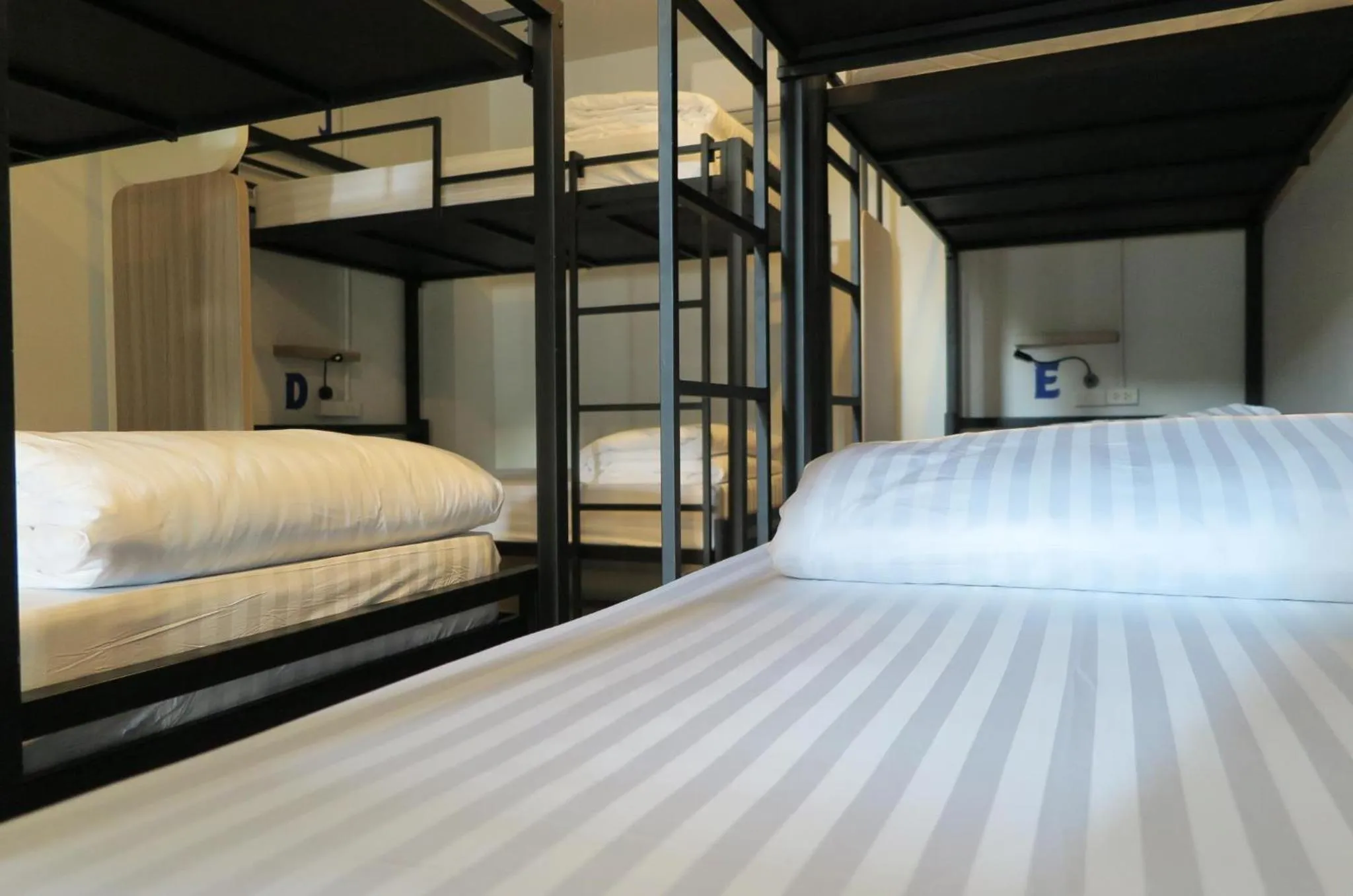 Bed in 6-Bed Mixed Dormitory Room in Phuket Marine Poshtel - SHA Plus