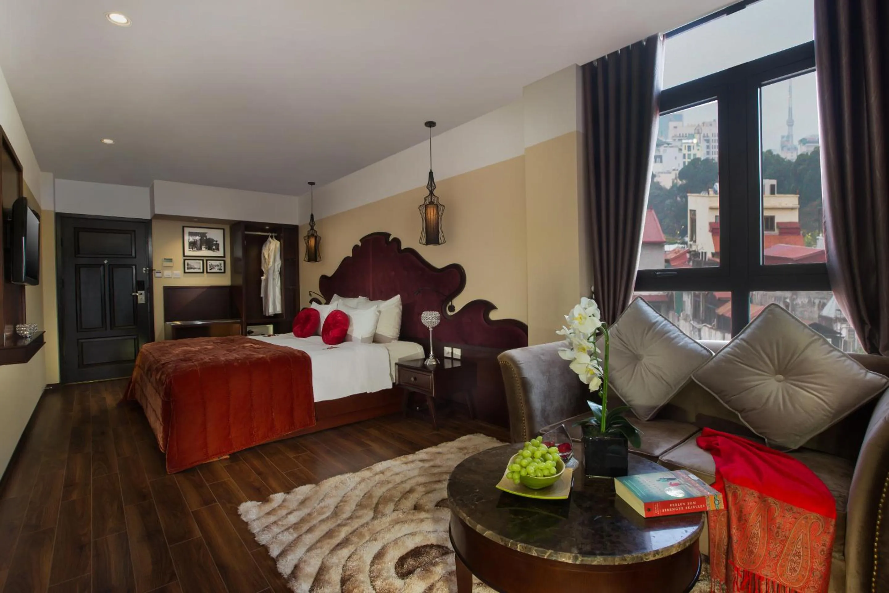 Seating area, Bed in Ambassador Hanoi Hotel & Spa