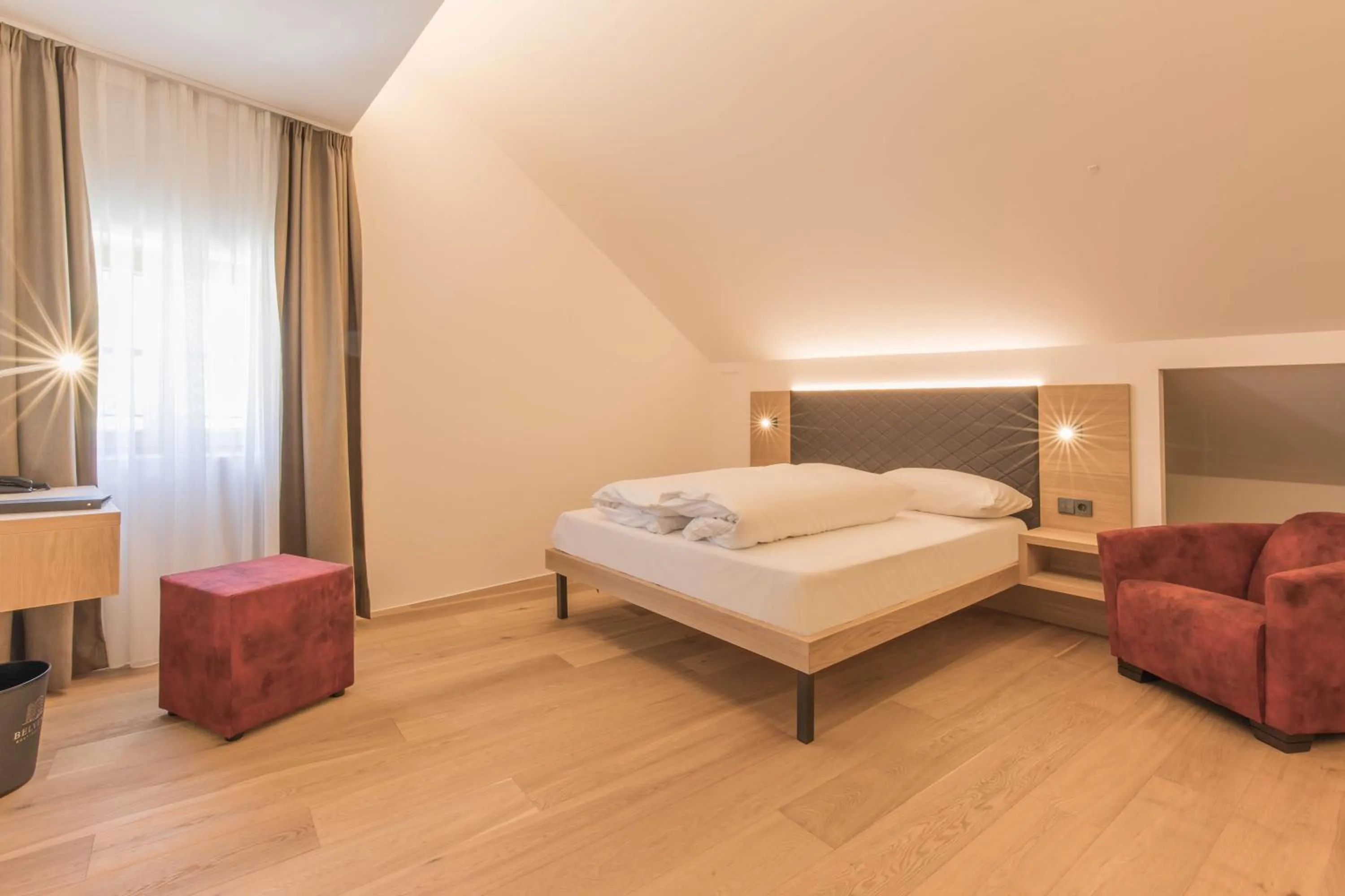 Bed in Belvenu Boutique Hotel