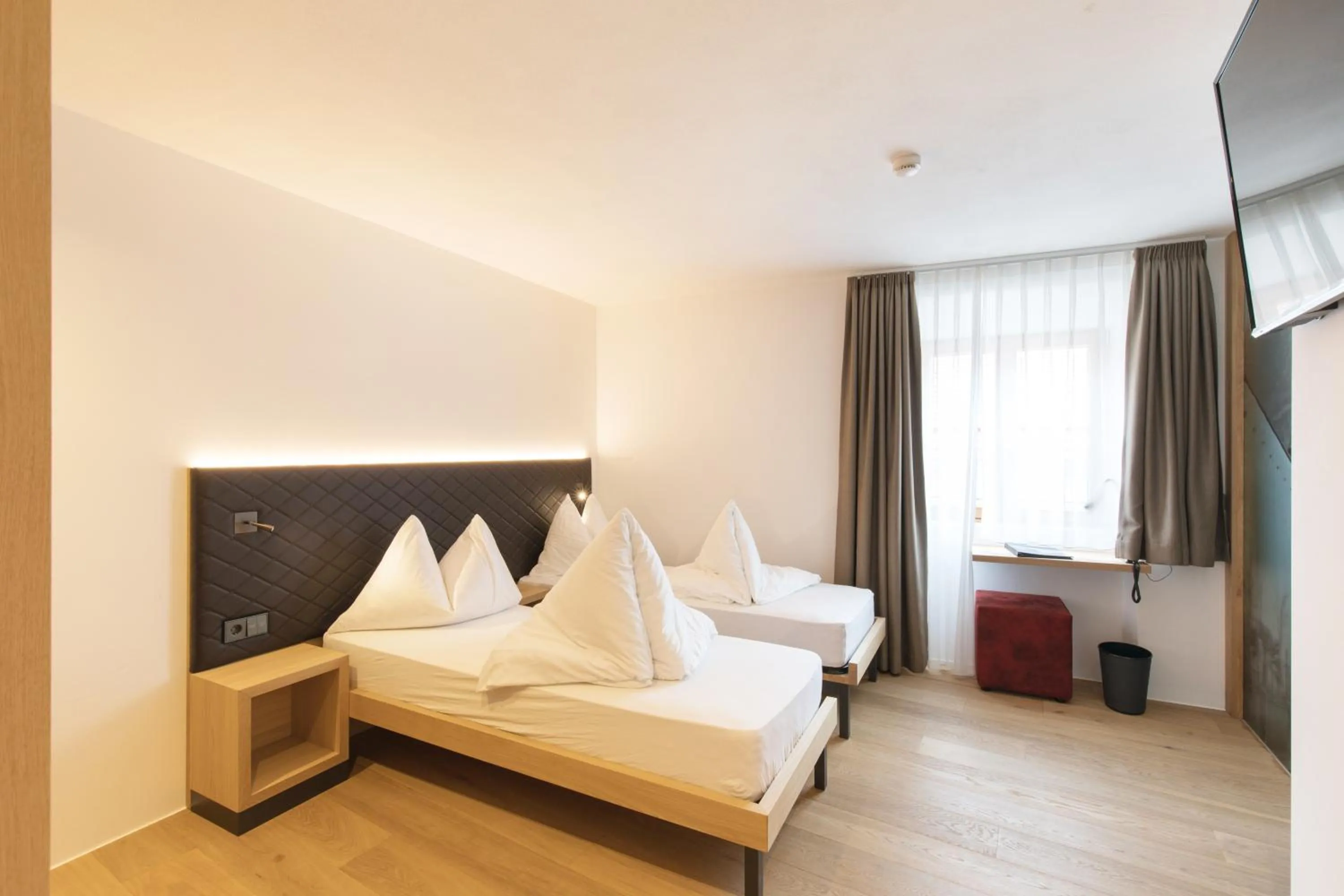 Bed in Belvenu Boutique Hotel