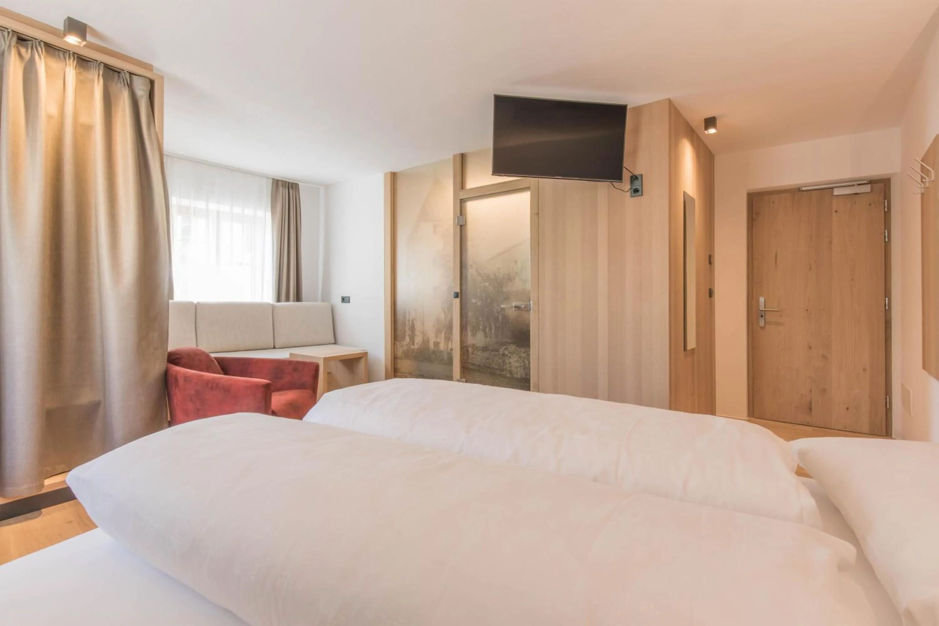 Bed in Belvenu Boutique Hotel