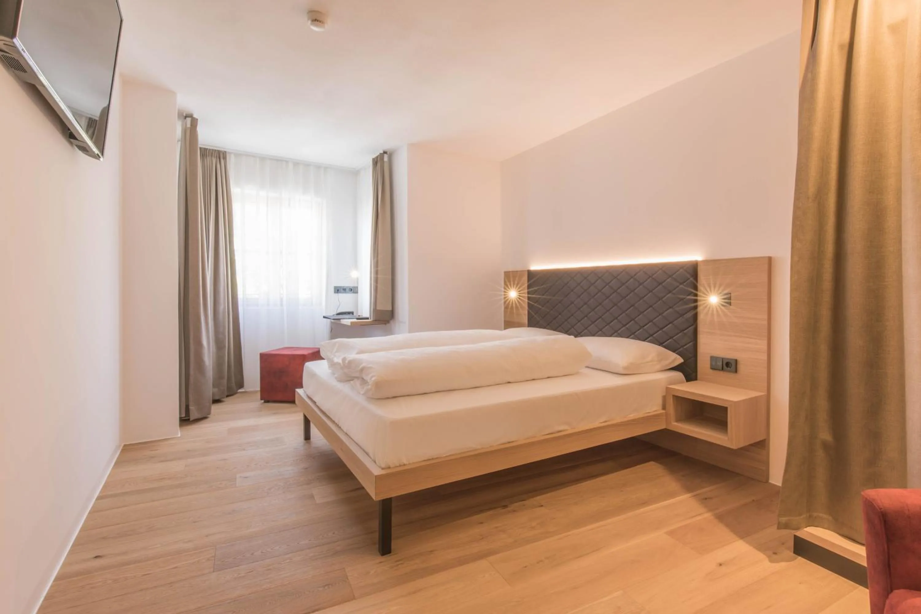 Bed in Belvenu Boutique Hotel