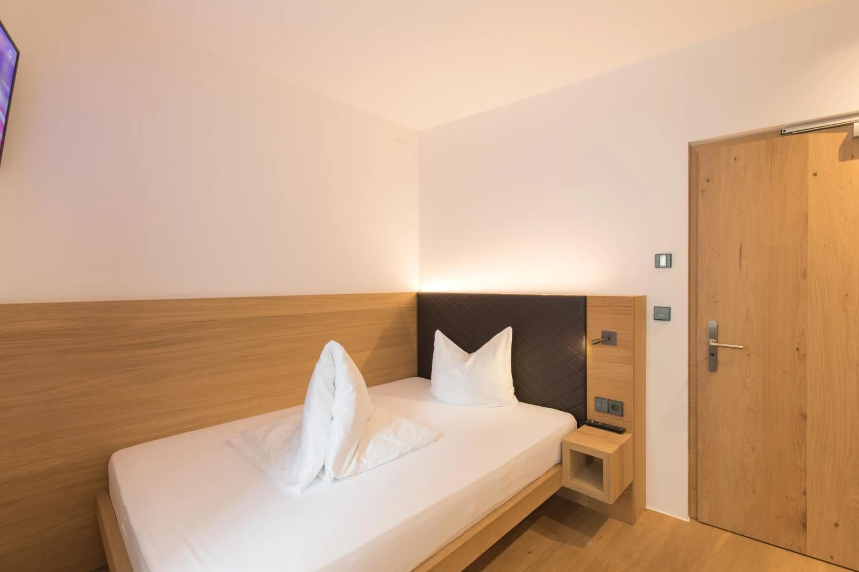 Bed in Belvenu Boutique Hotel