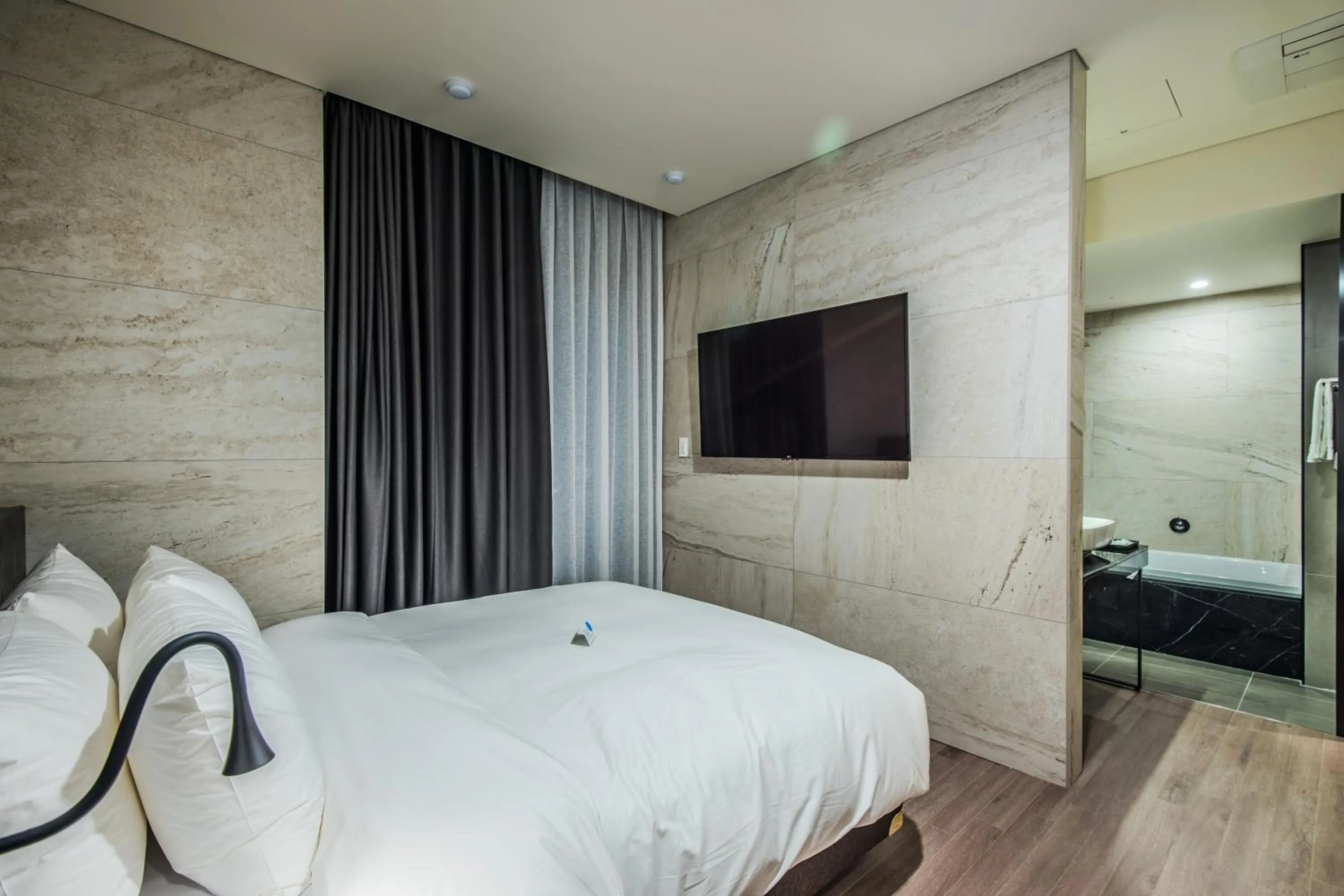 Bed in Rivertain Hotel