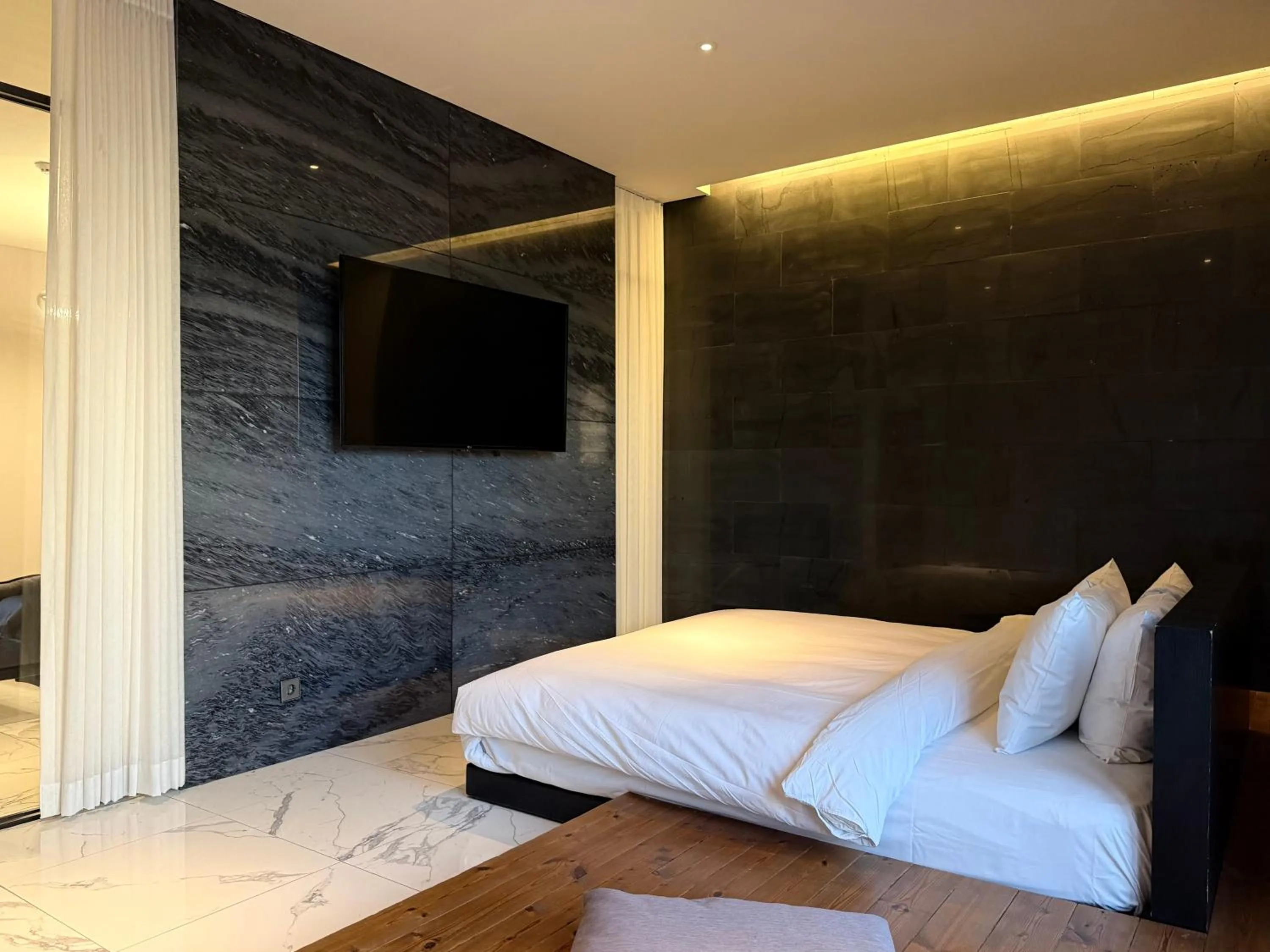 Bed in Rivertain Hotel