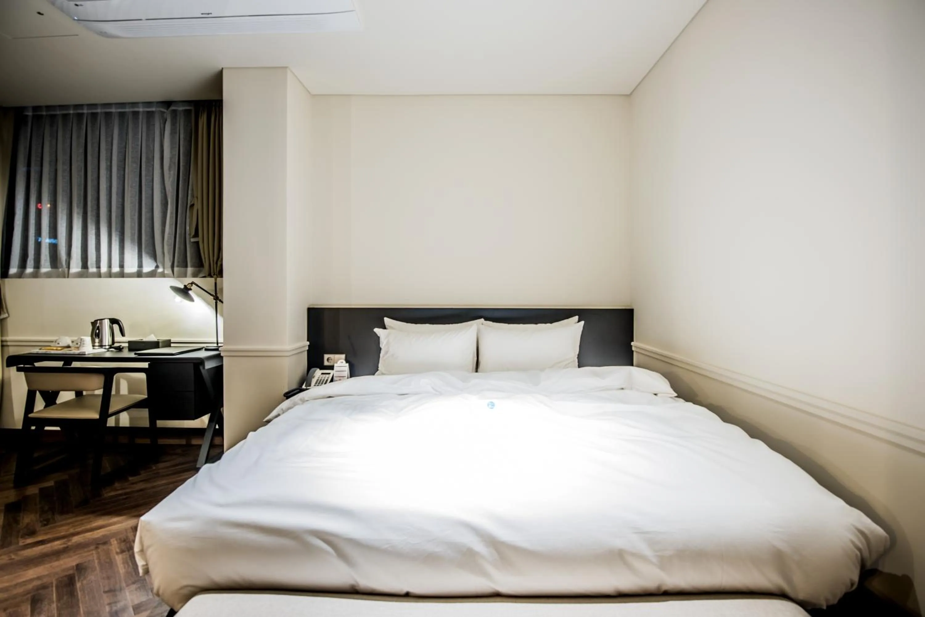 Bed in Rivertain Hotel