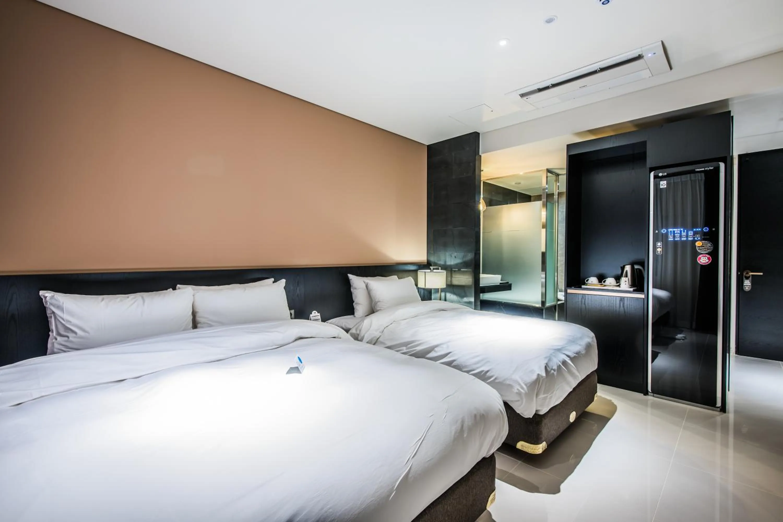 Bed in Rivertain Hotel