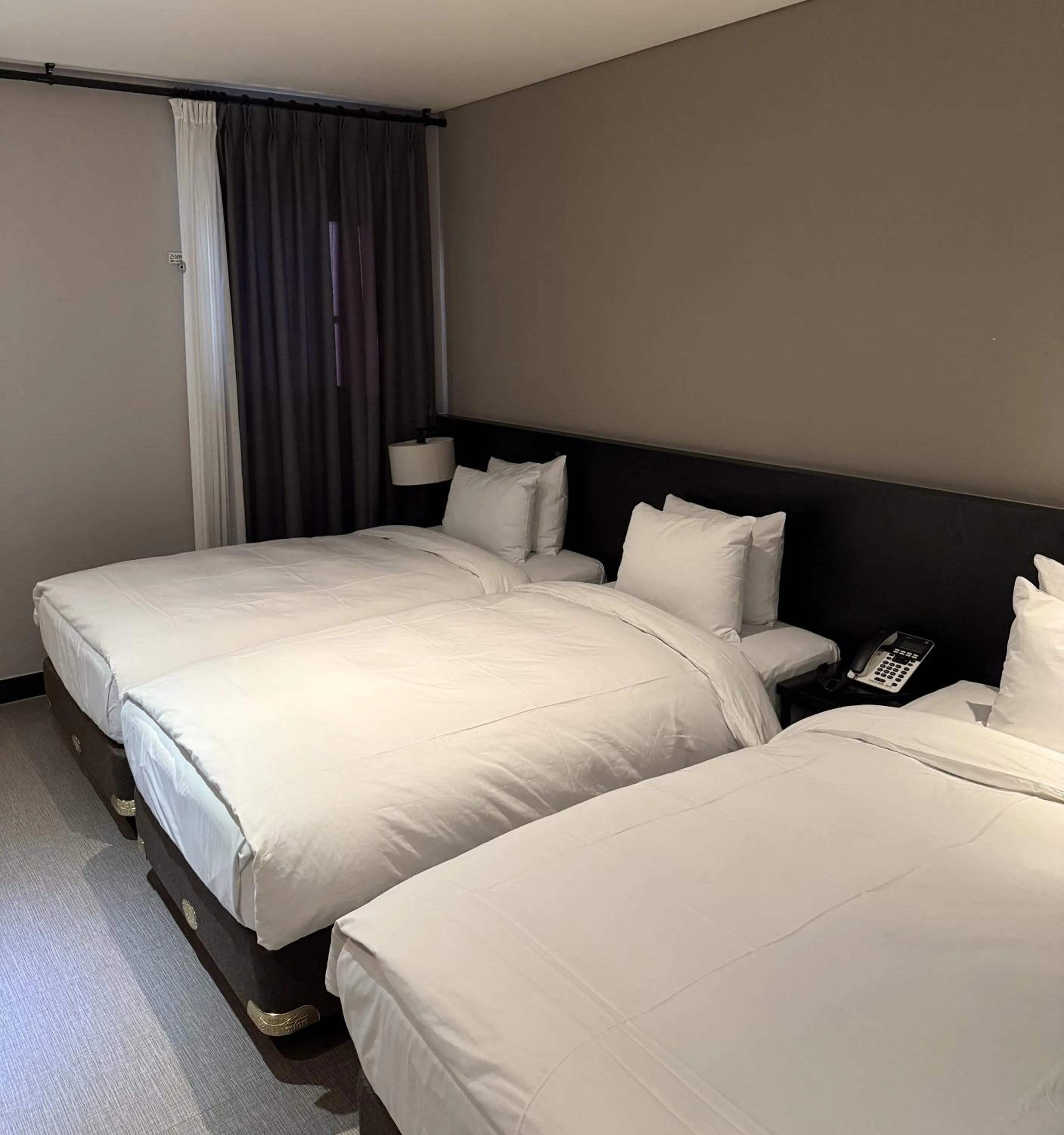 Bed in Rivertain Hotel