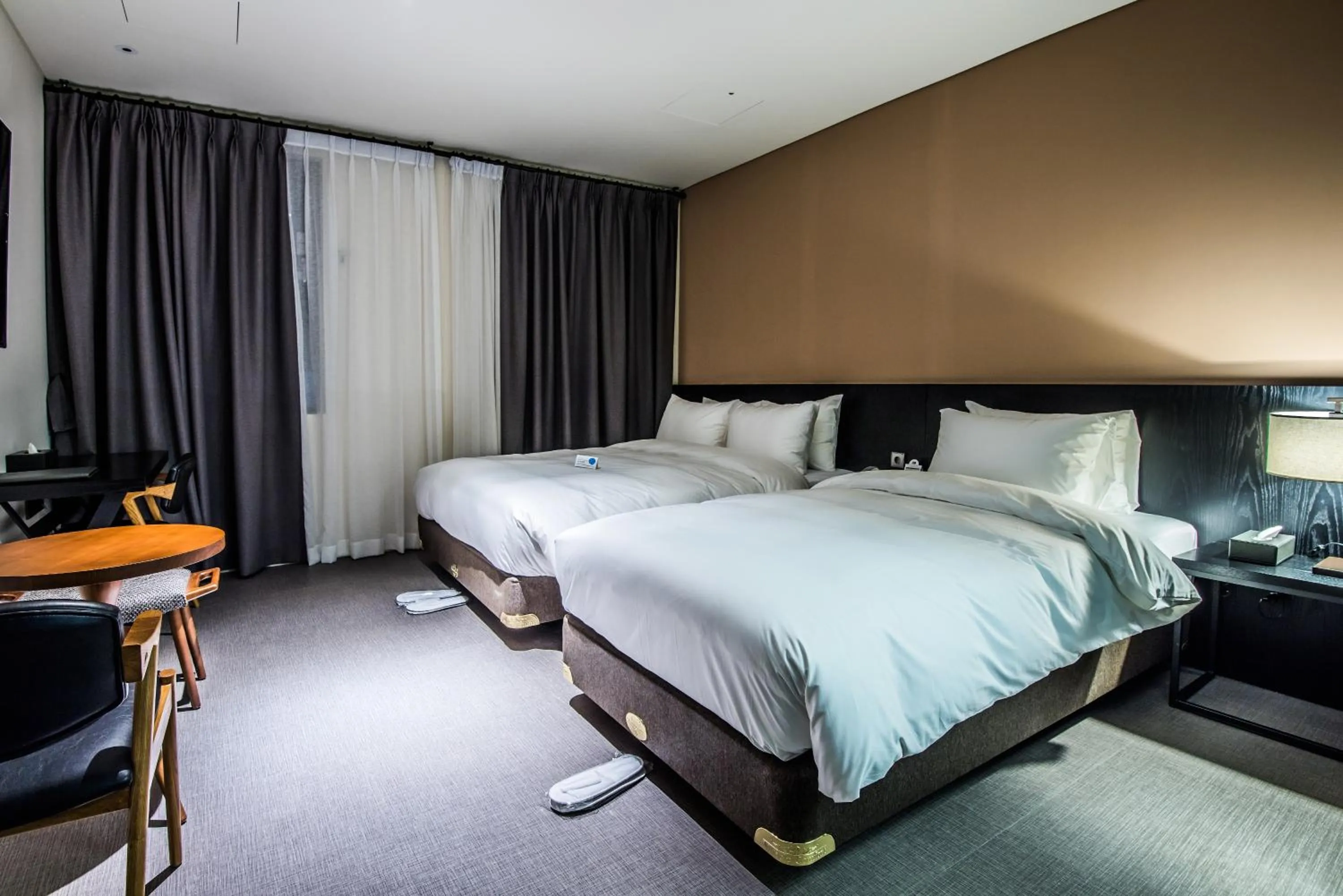 Bed in Rivertain Hotel